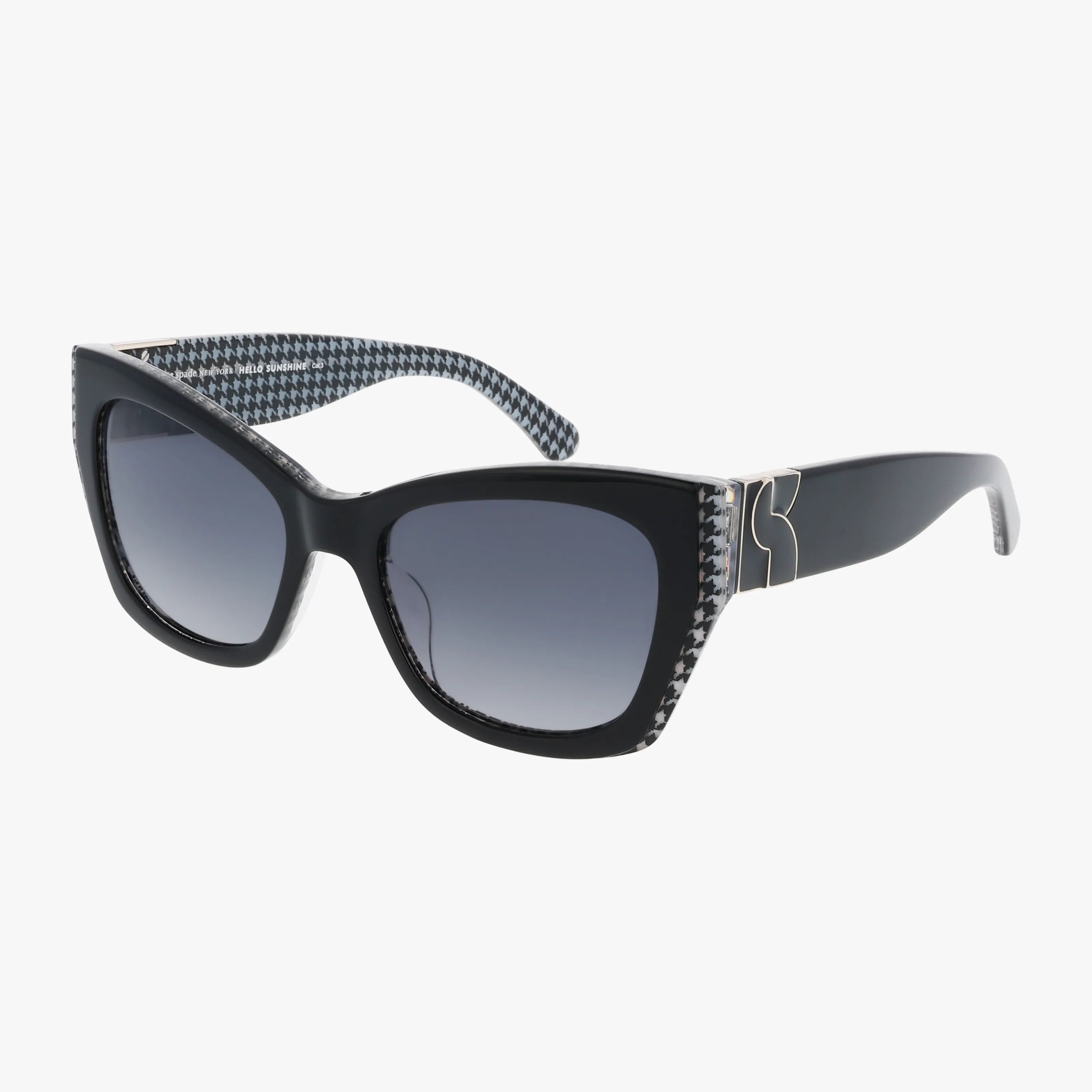 The Kate Spade JAYDA/G/S black cat-eye sunglasses feature gradient dark lenses, a houndstooth pattern inside the frame, and metallic K detail on the temples—ideal for stylish online eyewear shopping.