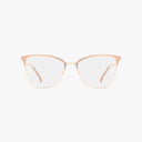 The St. Moritz BRIDGETTE eyeglasses feature thin gold metal frames with light pink accents on the upper rims, offering distinct style and functionality, shown against a plain white background.