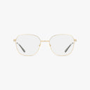 The Precision 509 eyeglasses feature thin, gold, hexagonal metal frames with clear lenses and black-tipped temples. Displayed on a plain white background, these glasses blend bold style with everyday excellence.