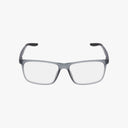 The NIKE 7116 by Nike are rectangular eyeglasses with transparent gray frames and clear lenses, offering a versatile style that suits both streetwear and office looks, displayed on a plain white background.