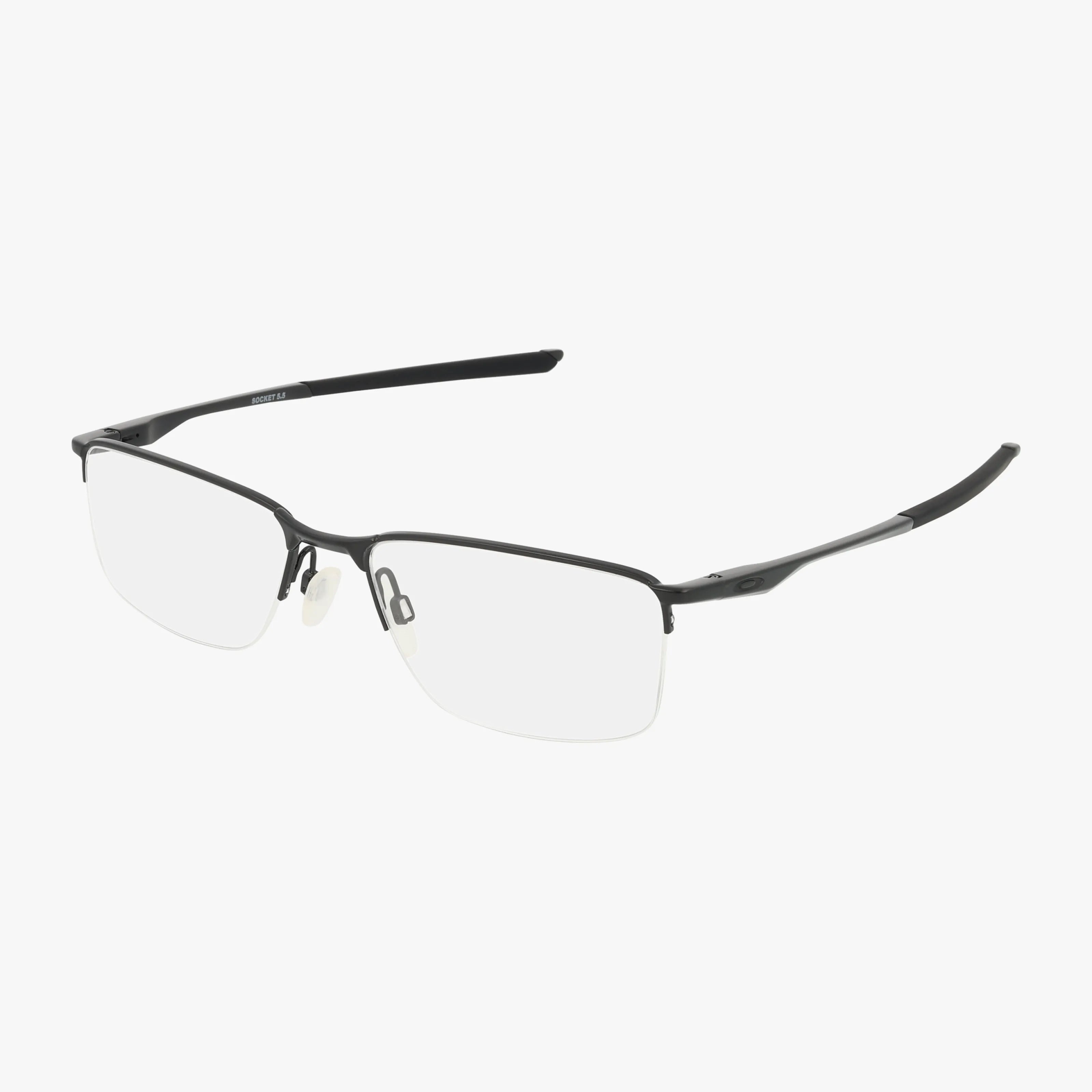 The Oakley OX3218 SOCKET 5.5 features black, semi-rimless lightweight glasses with rectangular lenses and thin metal frames, displayed on a white background.
