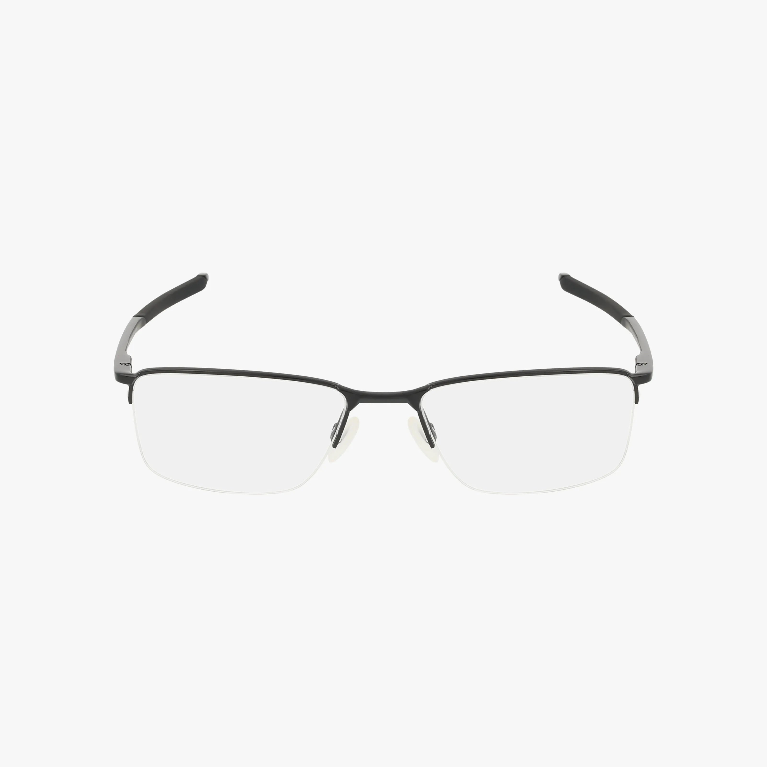 The Oakley OX3218 SOCKET 5.5 features black, half-rim lightweight rectangular frames with clear nose pads, shown on a plain white background—ideal for anyone shopping for glasses online.