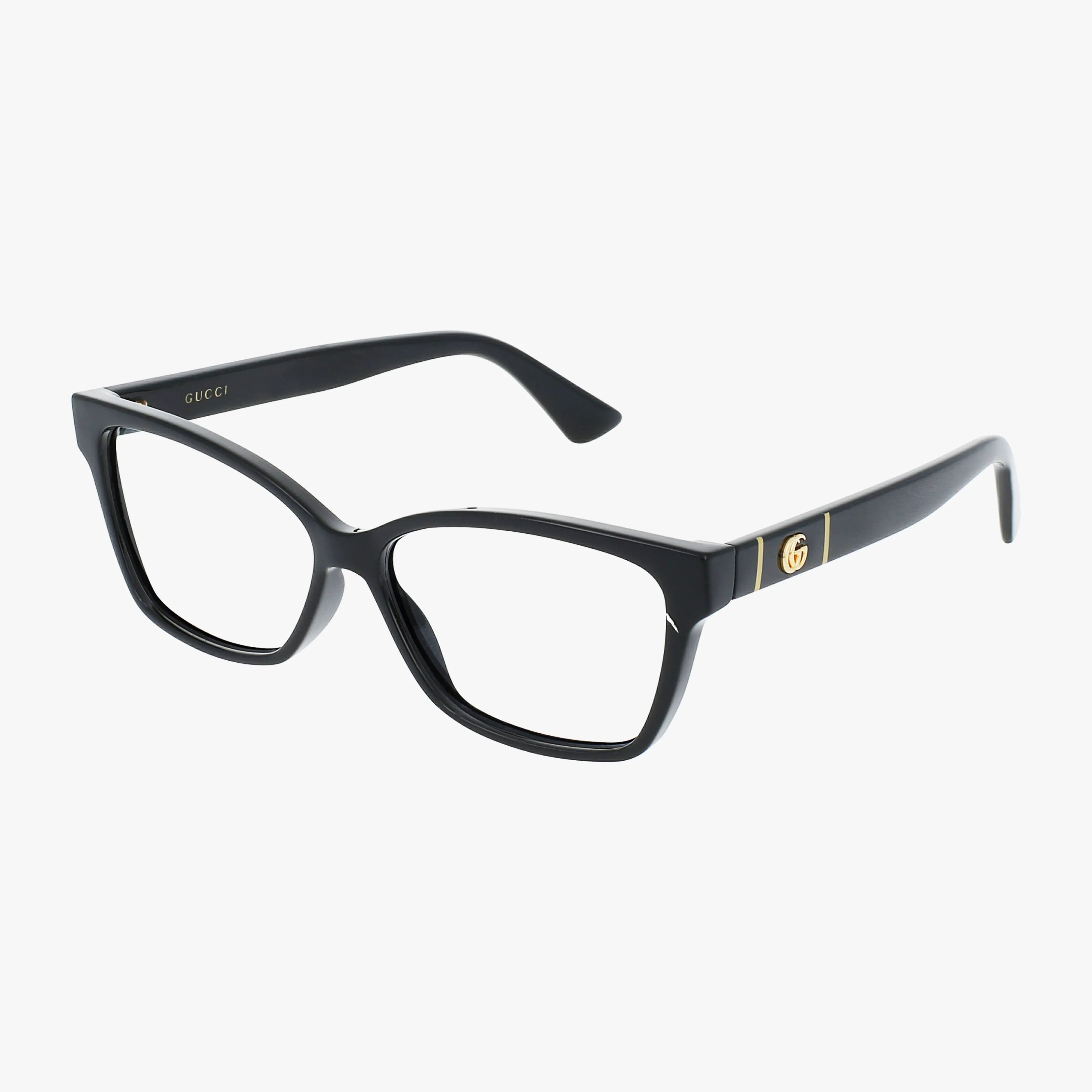 Gucci GG0634O eyeglass frames feature a black rectangular design with thick rims, gold accents, and the signature Gucci logo on the temple, shown against a white background.