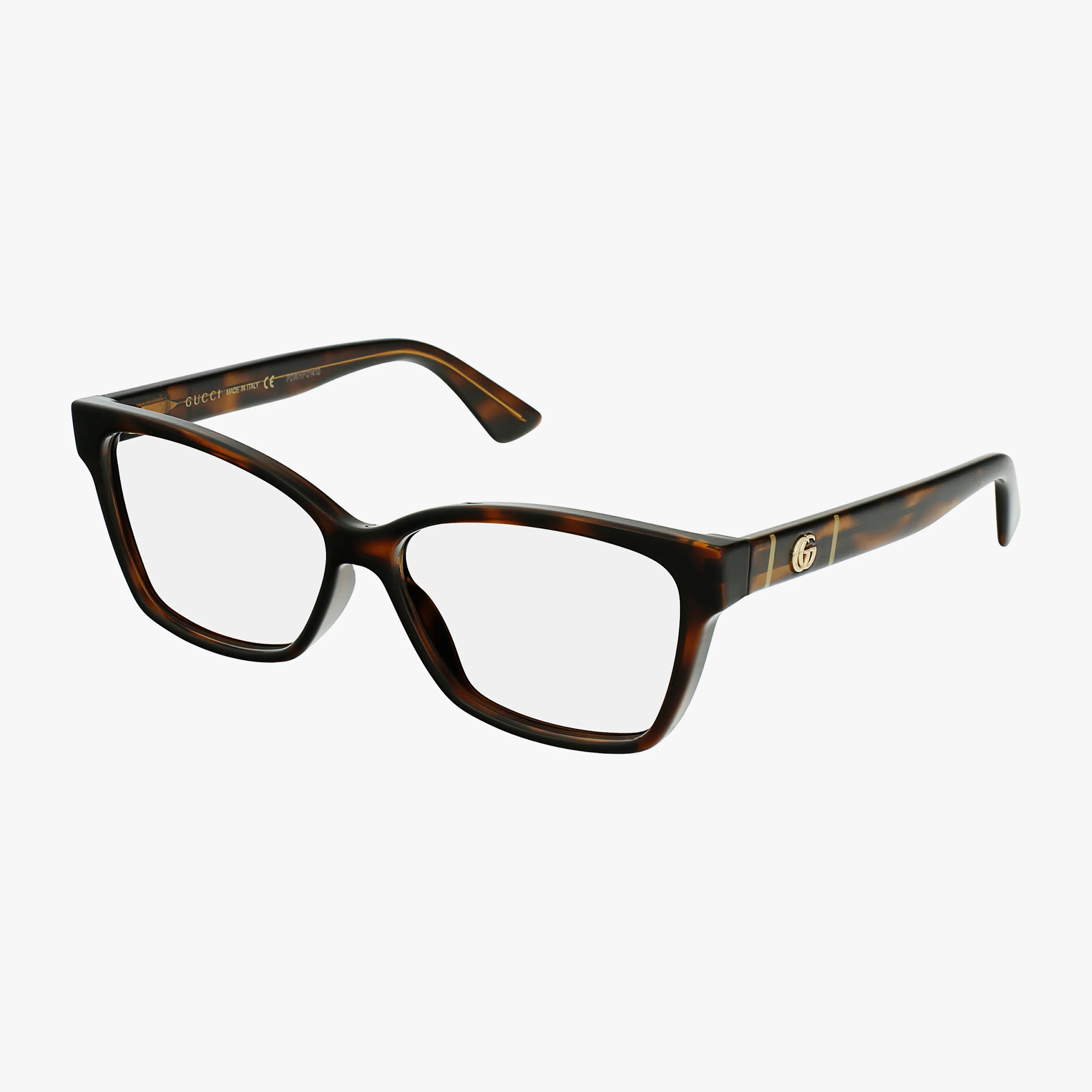 Gucci GG0634O eyeglasses feature thick tortoiseshell rectangular frames, clear lenses, a gold Gucci logo on the temples, and slightly curved arms, shown against a plain white background.