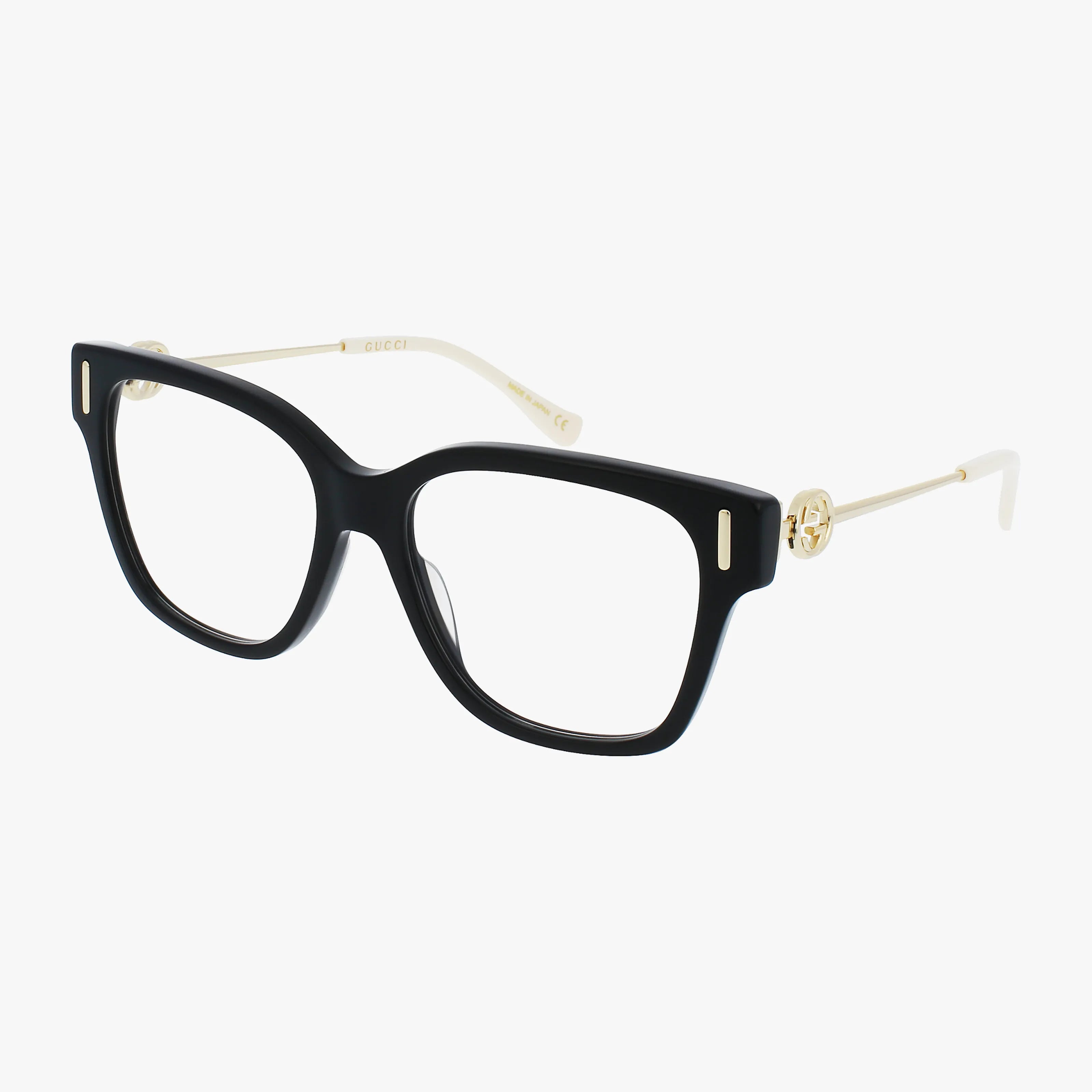 The Gucci GG1204O features black rectangular designer eyeglasses with thick plastic fronts and slim gold metal arms, shown on a white background—a refined statement from Gucci eyewear.
