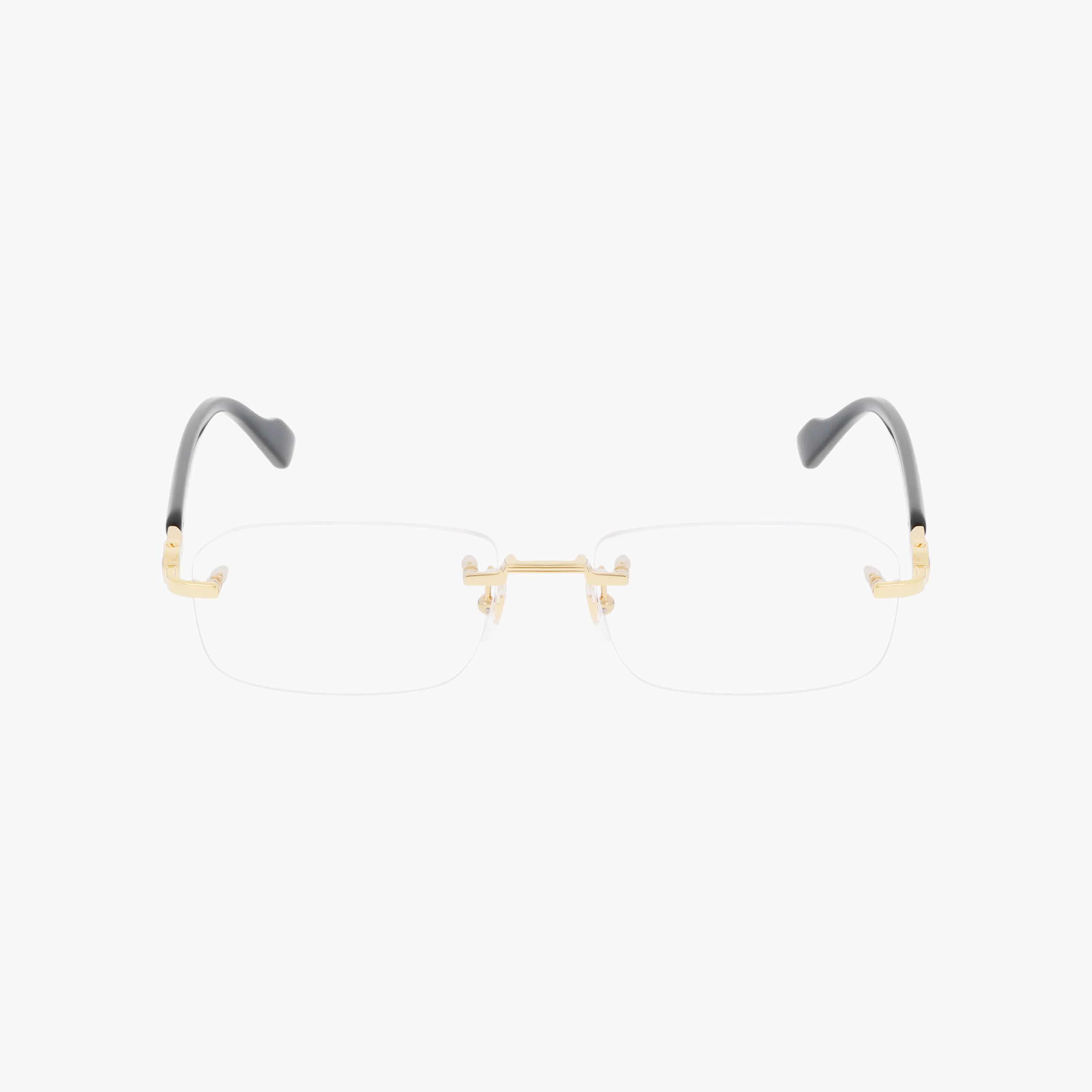 Gucci GG1221O rimless eyeglasses feature gold-toned temples and nose bridge with black temple tips, offering a tailored frame design—ideal for modern eyewear enthusiasts. Displayed on a white background.