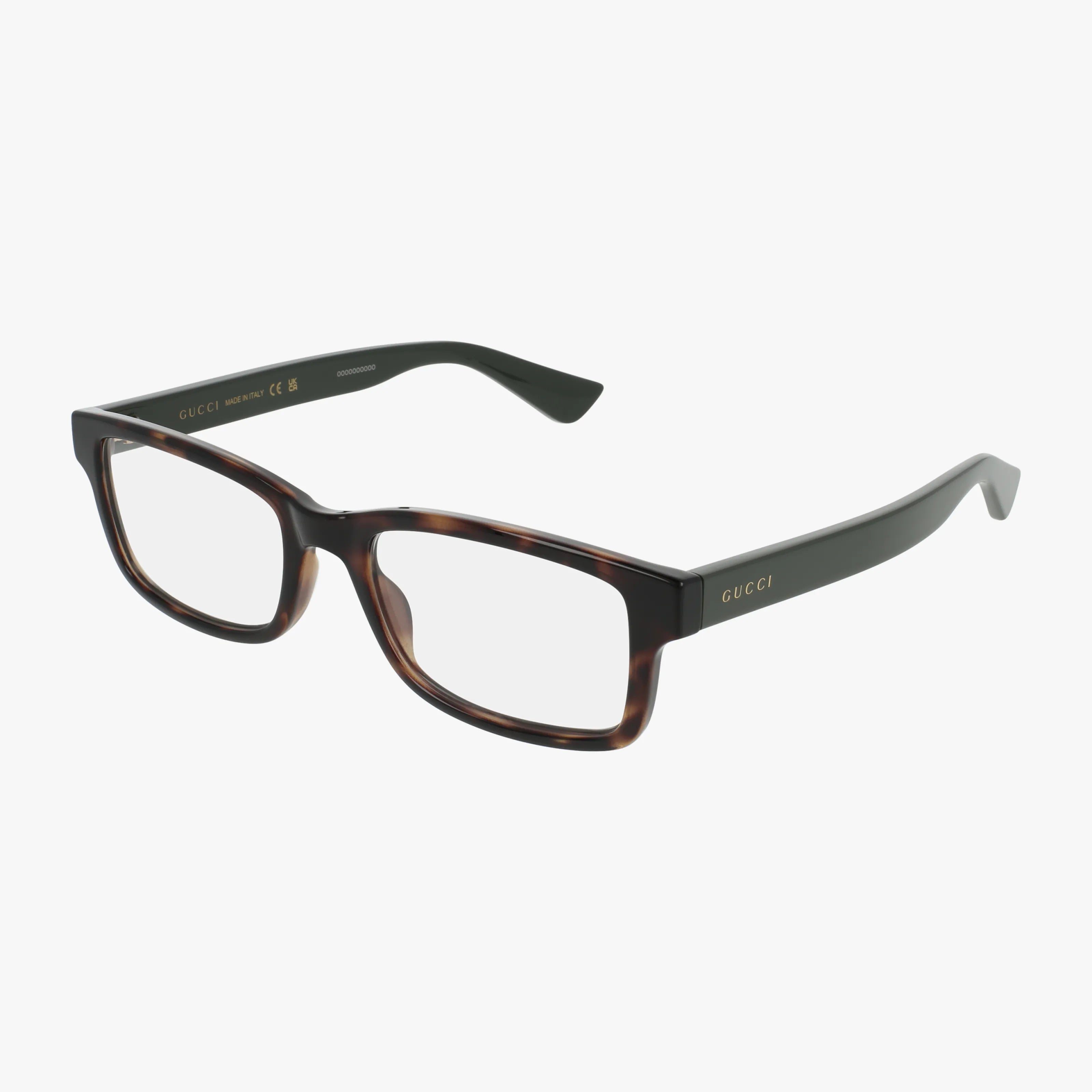 Gucci GG1717O rectangular tortoiseshell eyeglasses with black arms and signature branding on the side, featuring a modern frame, displayed against a white background.