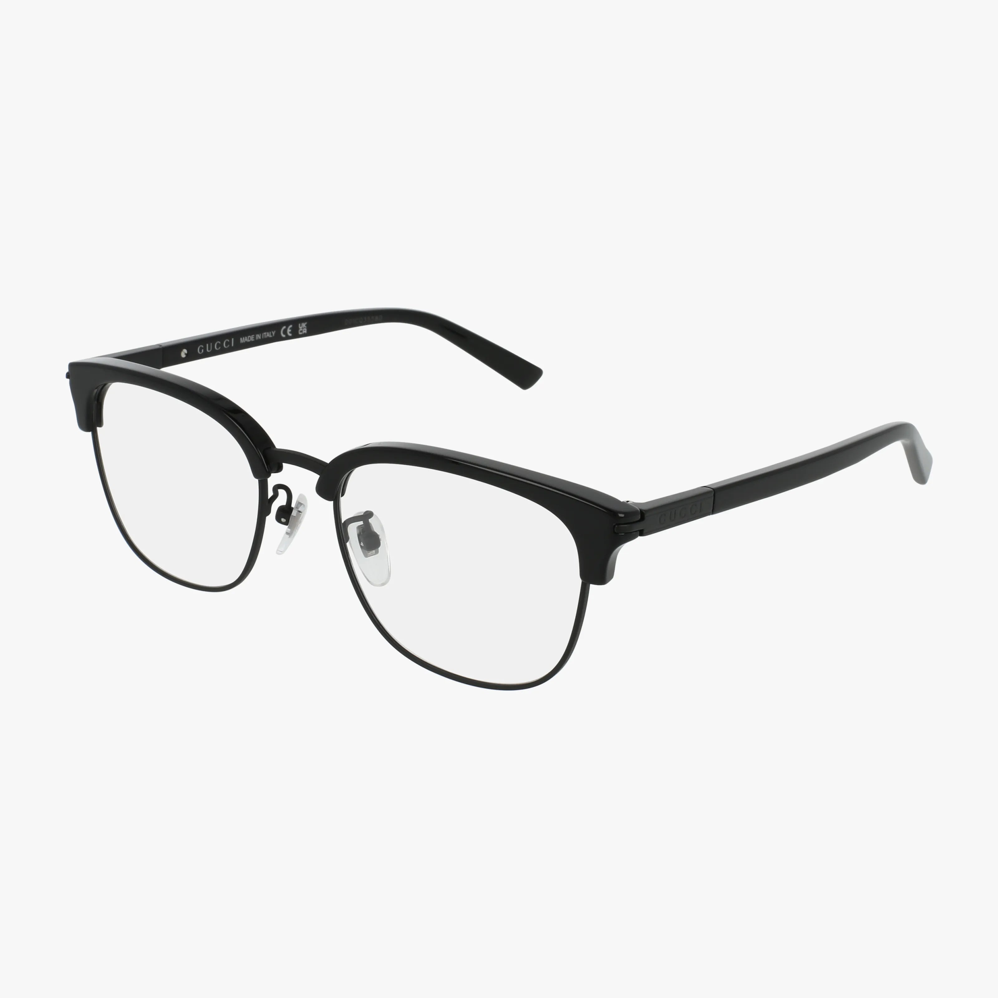 The Gucci GG1901OA eyeglasses feature a black, semi-rimless frame with clear lenses and metal nose pads, offering a refined and elegant look against a plain white background.
