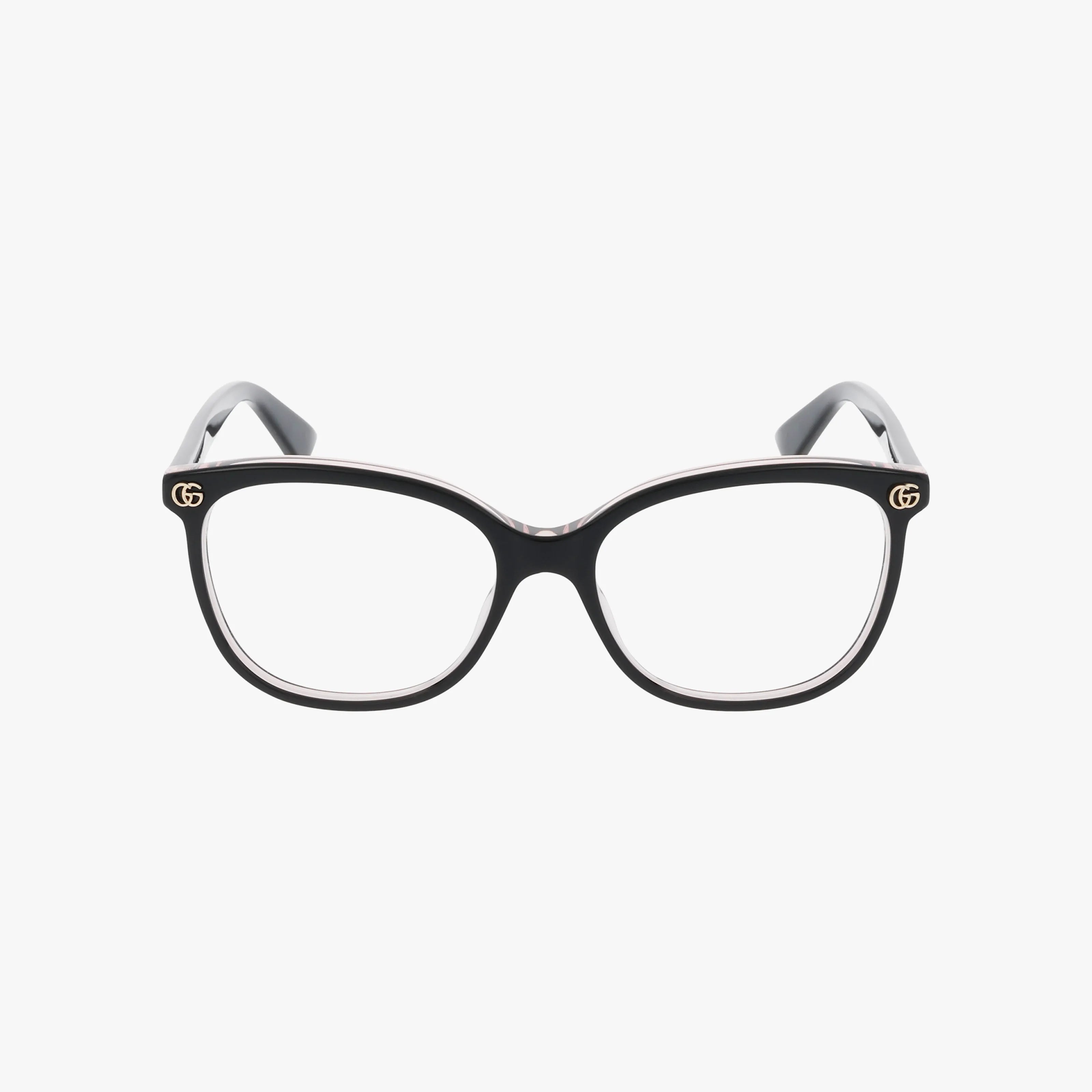 The Gucci GG1816O eyeglasses are black, square-shaped frames with clear lenses and small gold GG logos on the top corners, showcasing quality craftsmanship against a plain white background.