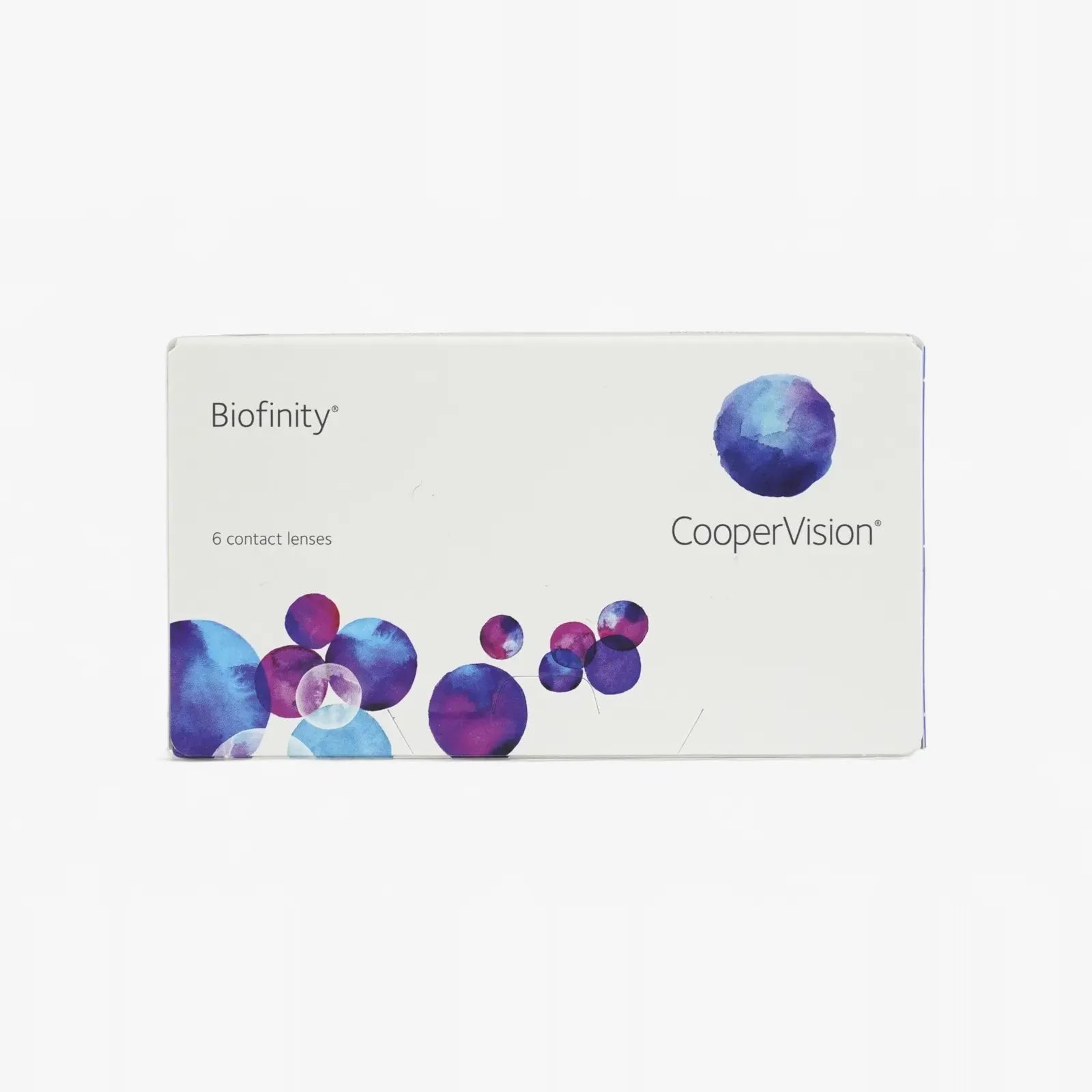 A white box of Biofinity - 6 Pk contact lenses displays the brand name, product info, and blue-purple circles. These Biofinity lenses feature Aquaform Technology, with each box containing 6 contact lenses.