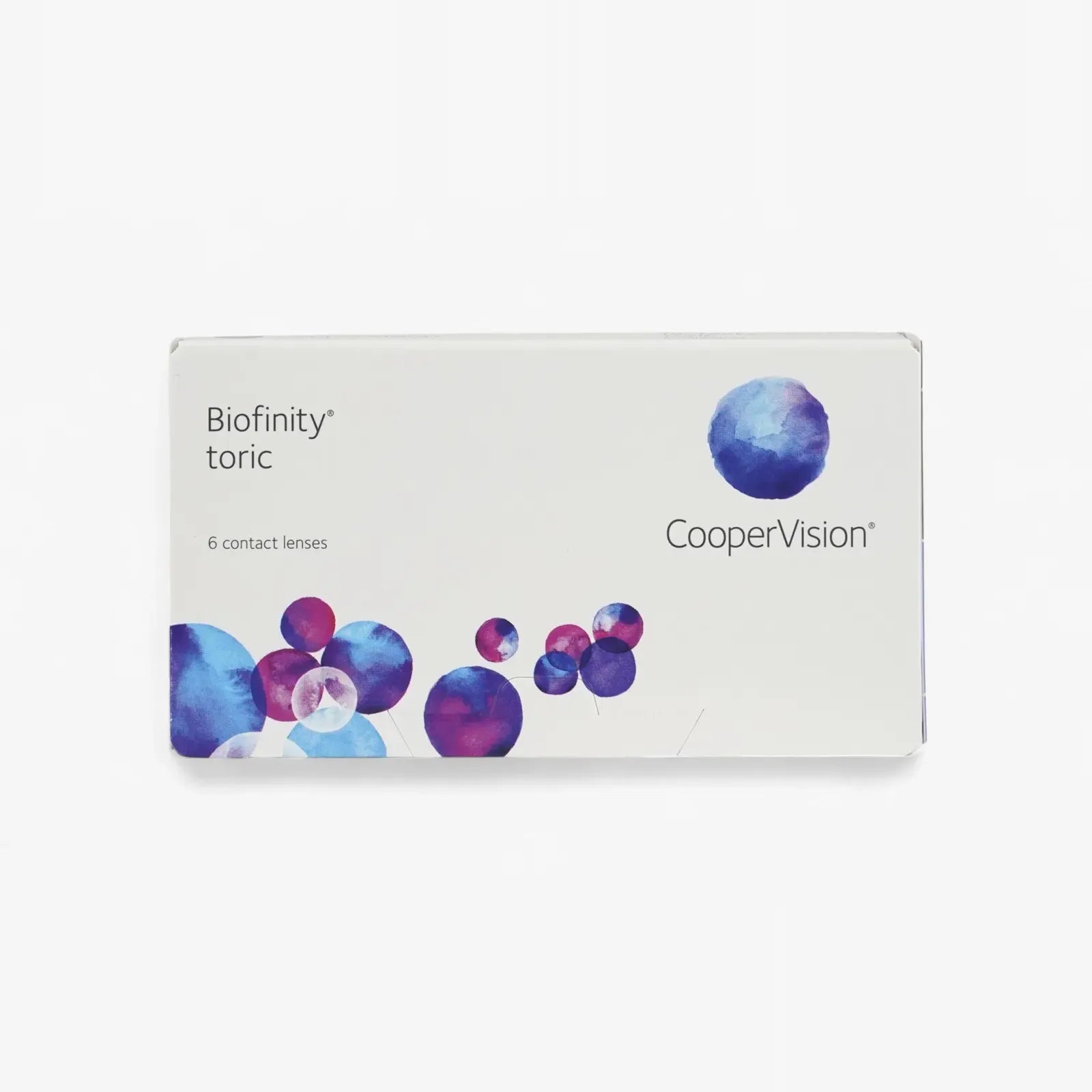 A box of Biofinity Toric - 6 Pk by Biofinity for astigmatism, with a white background, blue and purple circular designs, and text indicating it contains 6 lenses.