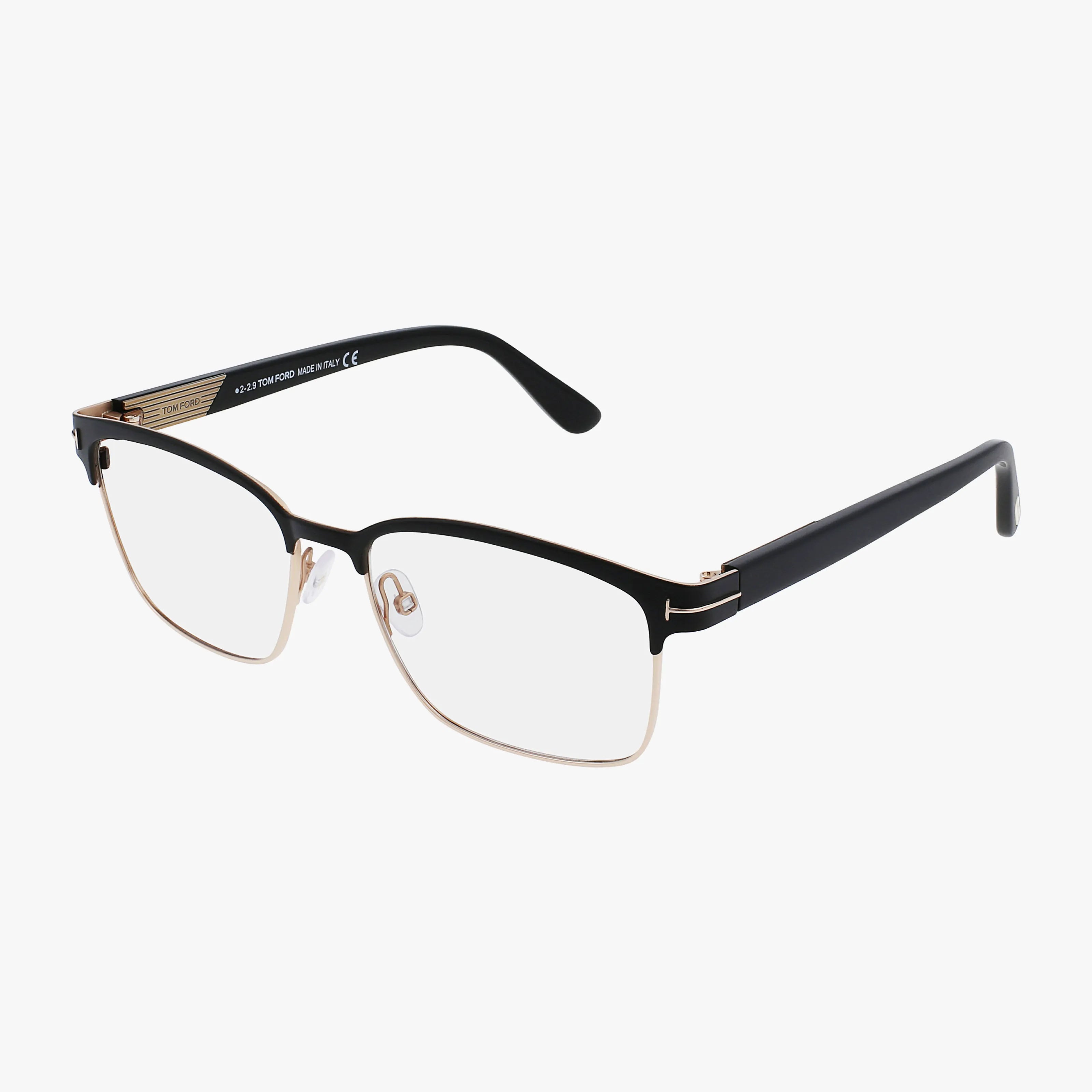 The Tom Ford FT5323 features rectangular black-and-gold modern frames with clear prescription lenses and black temples, all shown against a white background.