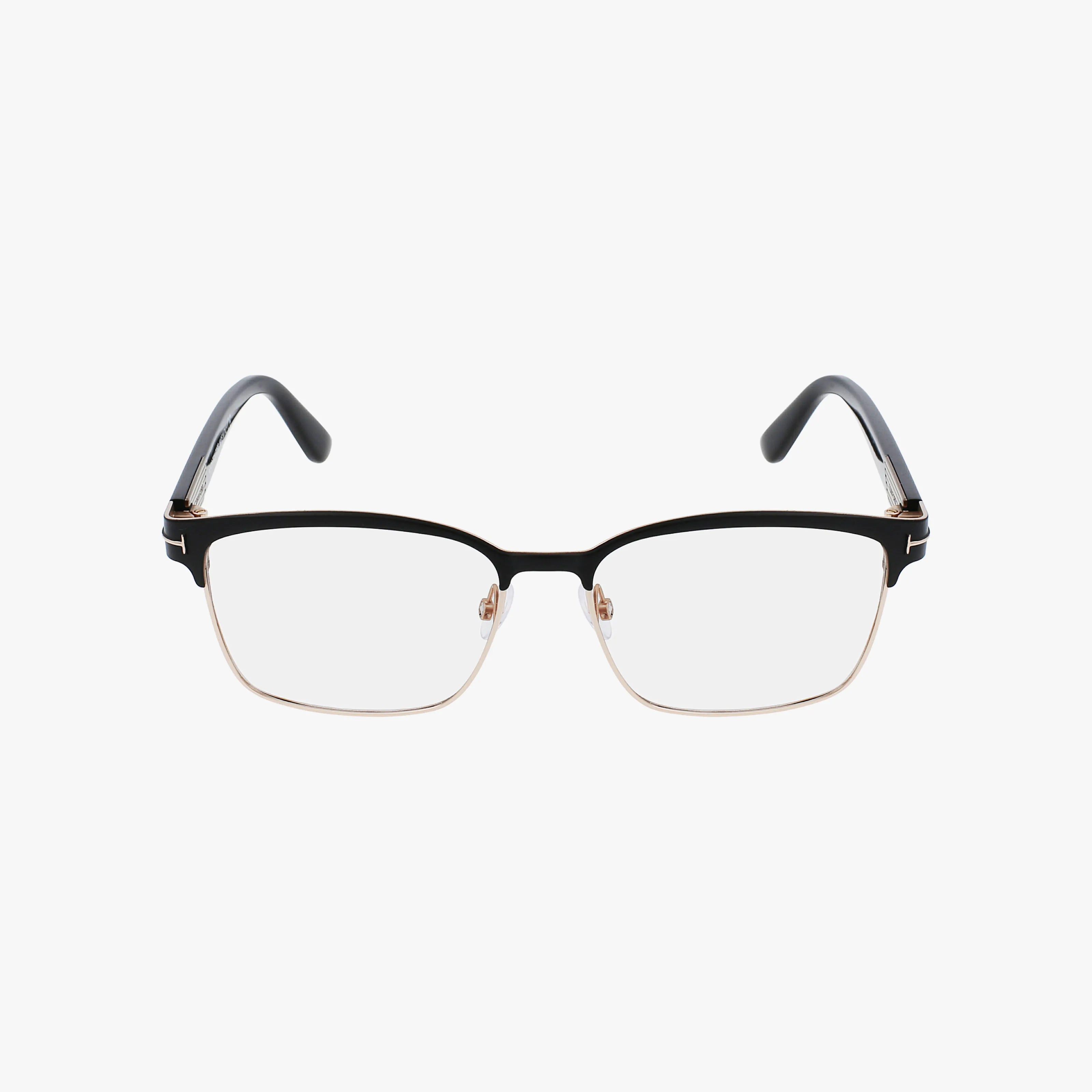 The Tom Ford FT5323 eyeglasses feature a rectangular shape with sleek black upper frames, gold lower rims, and clear lenses, shown against a white background.