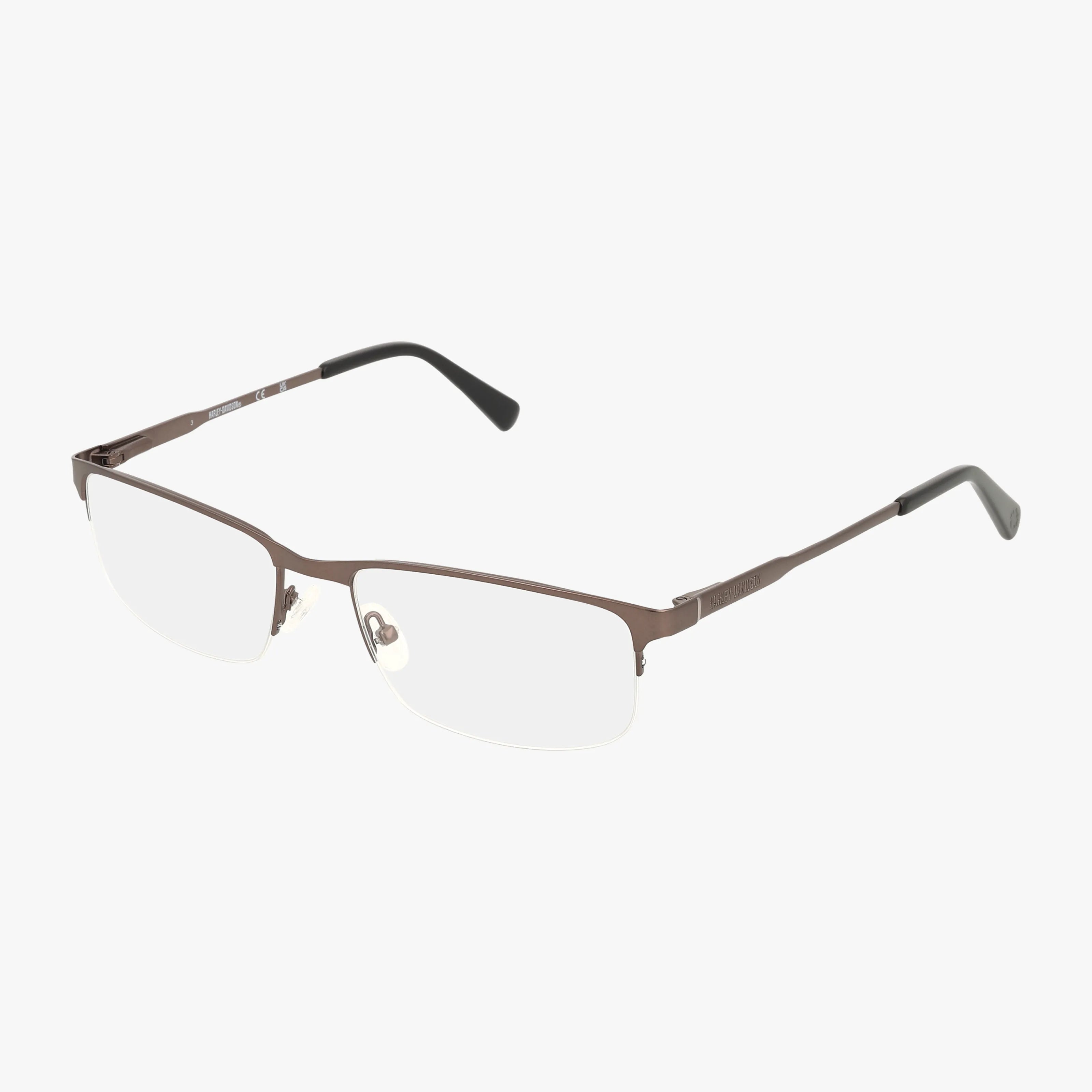 The Harley Davidson HD0759 eyeglasses feature a semi-rimless, thin metallic brown frame with clear lenses and black-tipped arms, offering a distinguished look. Displayed on a white background.