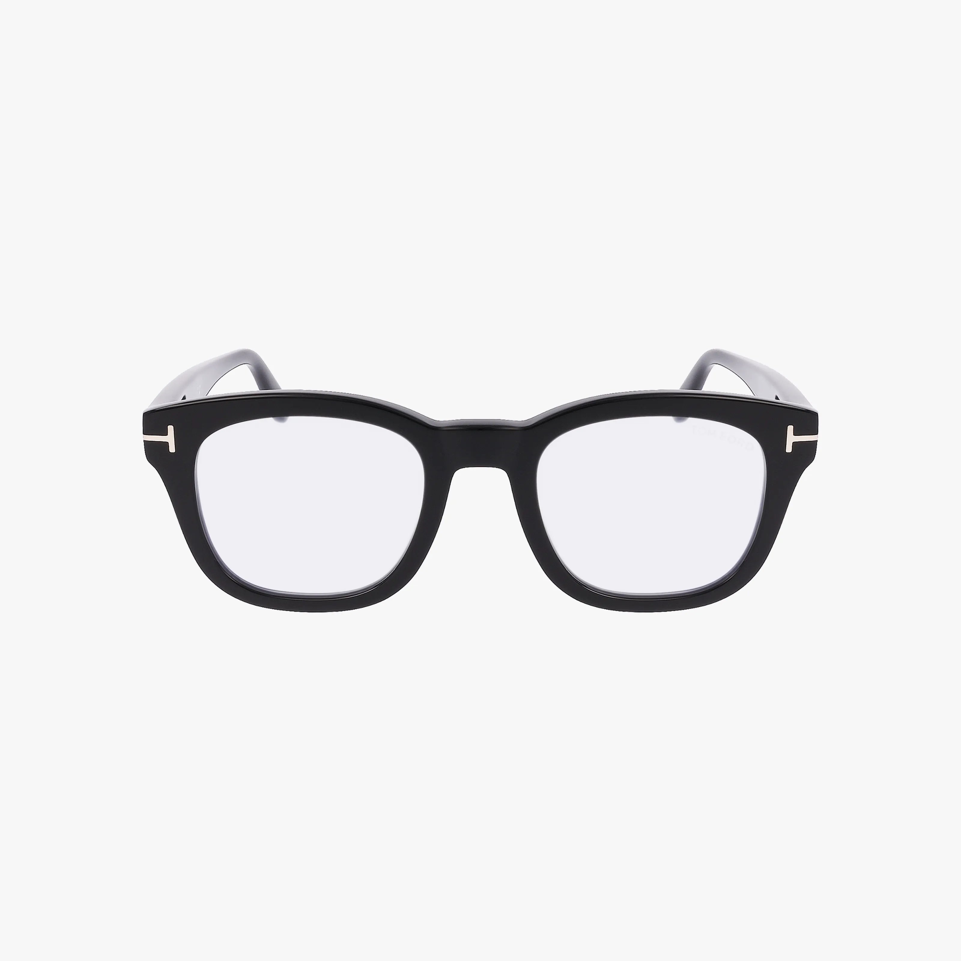 The Tom Ford FT5542-B eyeglasses feature a black rectangular lightweight frame, clear lenses, and silver accents on the upper corners—ideal for everyday use and showcased against a plain white background.