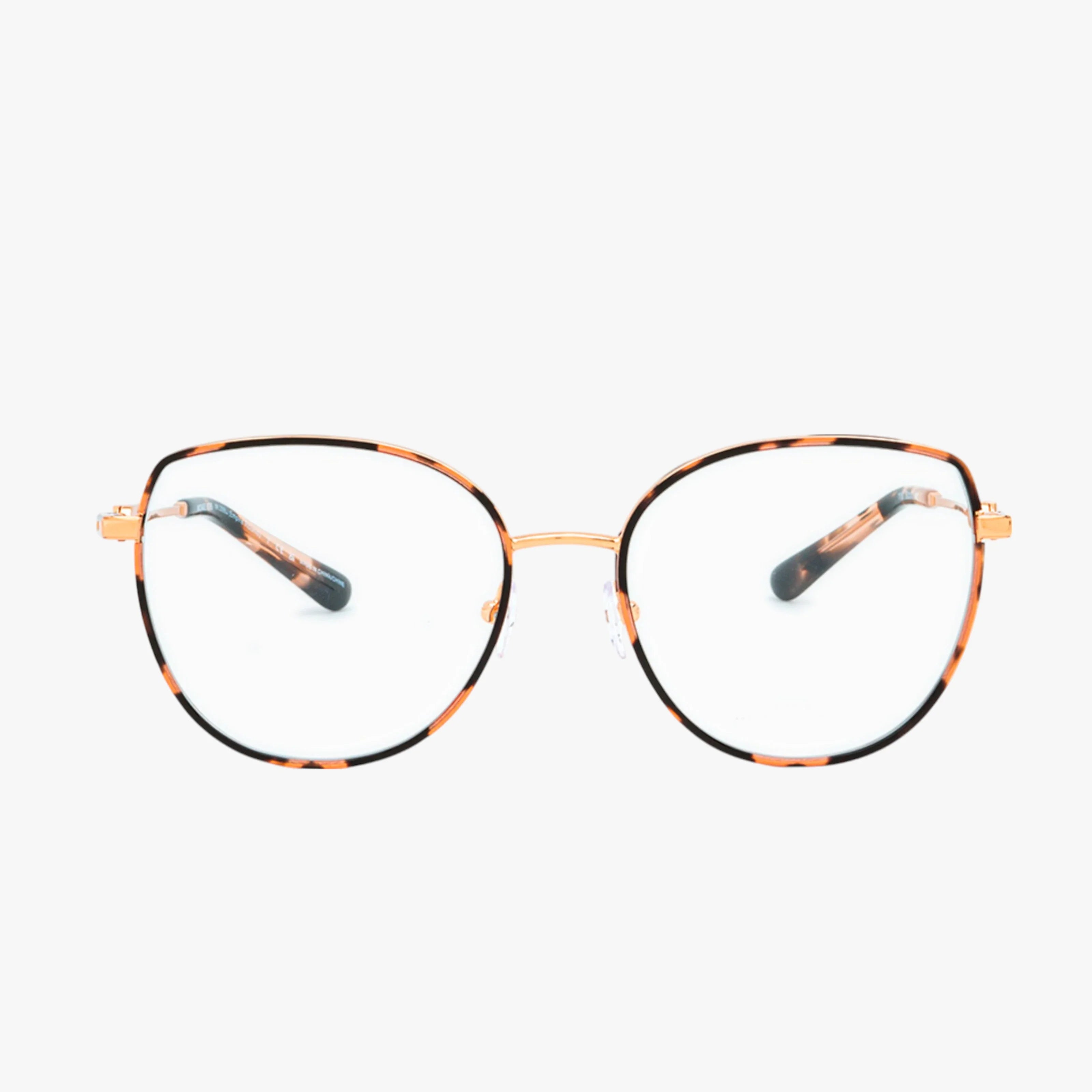 Michael Kors MK3066J gold metal eyeglasses feature large, round frames with a tortoiseshell pattern on the rims and temples for stylish durability, displayed on a white background.