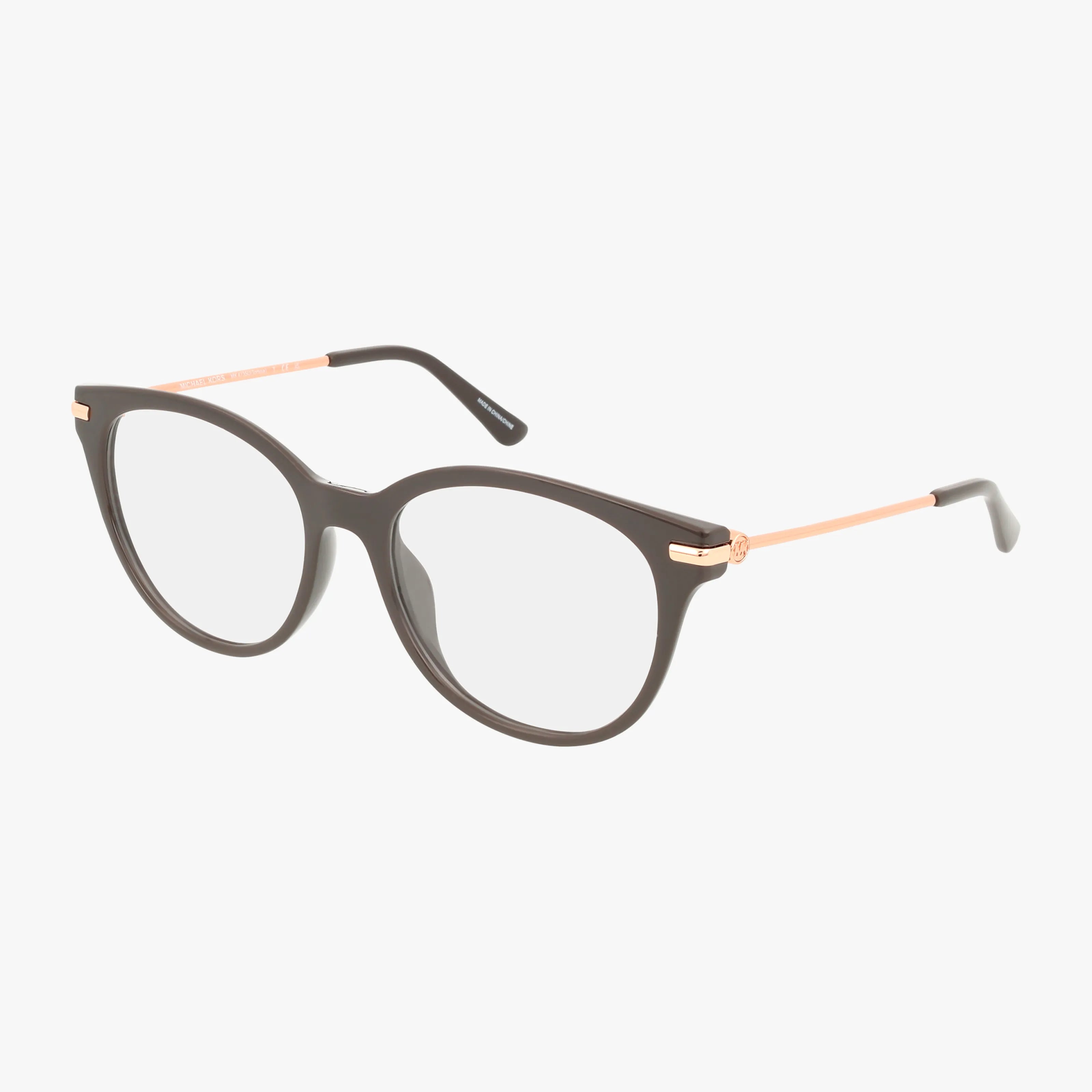 The Michael Kors MK4135U eyeglasses feature a round black frame, thin gold metal arms, and clear prescription lenses, showcased against a white background.