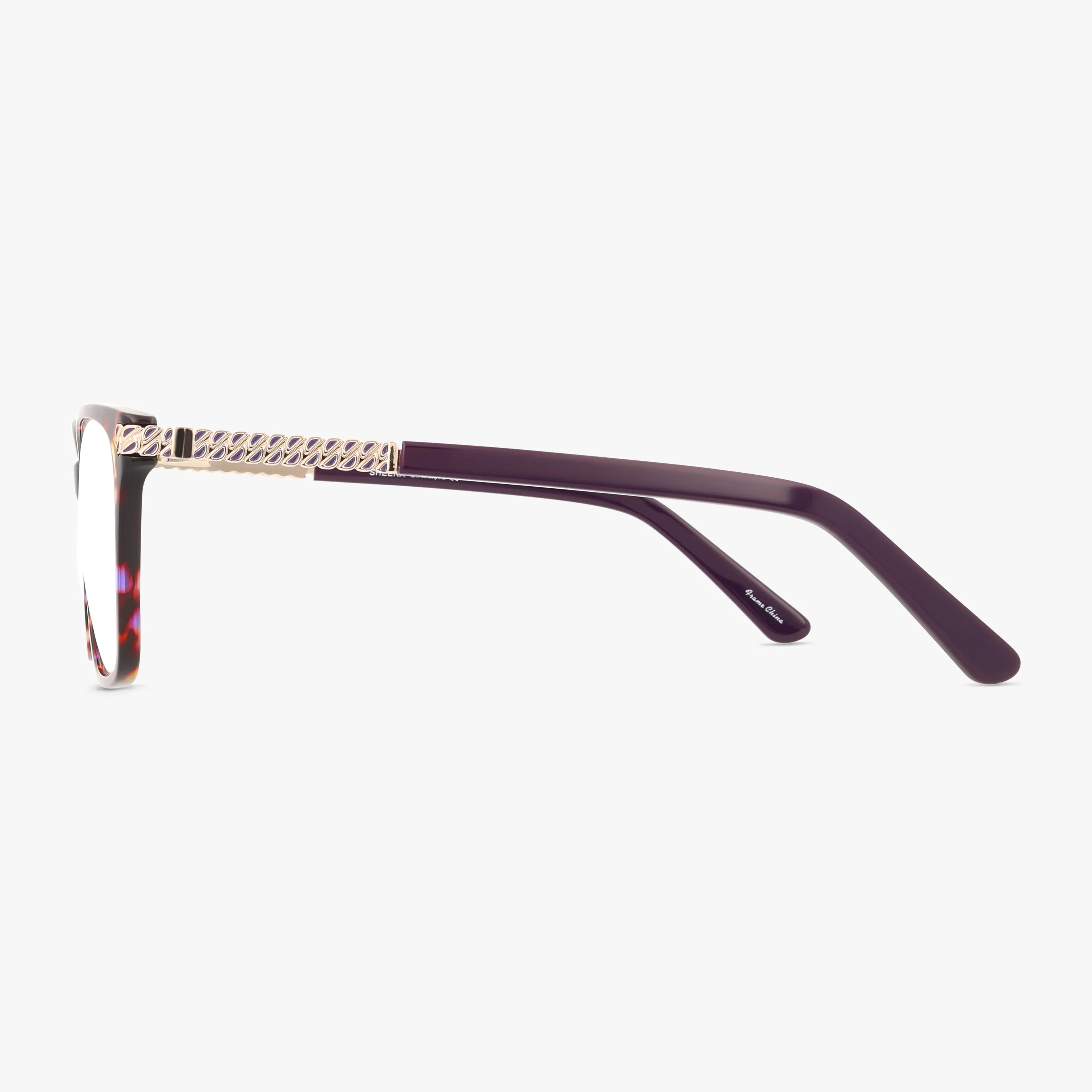 Side view of SHEENA by St. Moritz, featuring dark purple arms, gold textured hinge details, and a subtly patterned front that merges classic style with modern design—all set against a plain white background.
