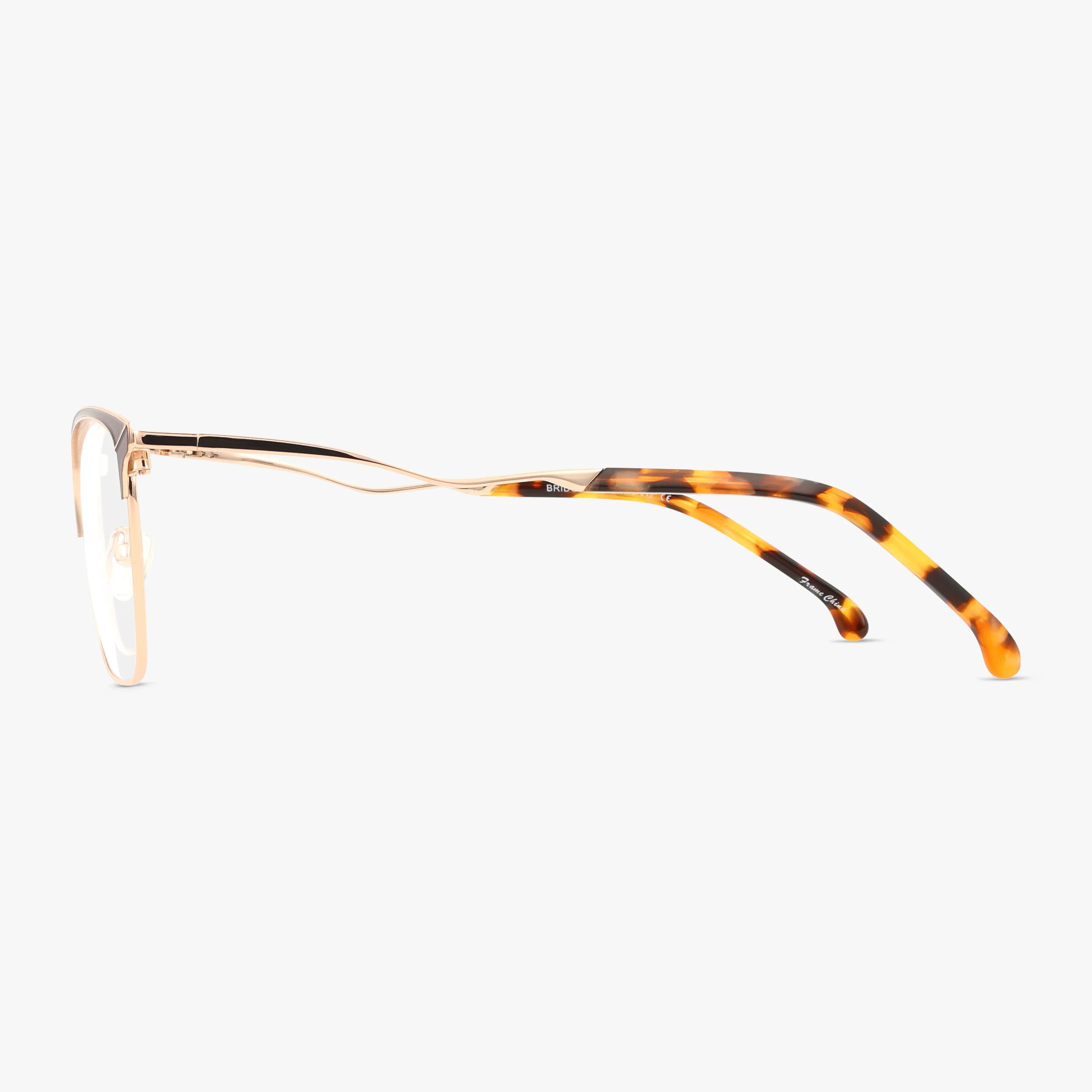 Side view of BRIDGETTE eyeglasses by St. Moritz, featuring thin gold metal frames, tortoiseshell-patterned arms, and progressive lenses in a stylish design, set against a plain white background.