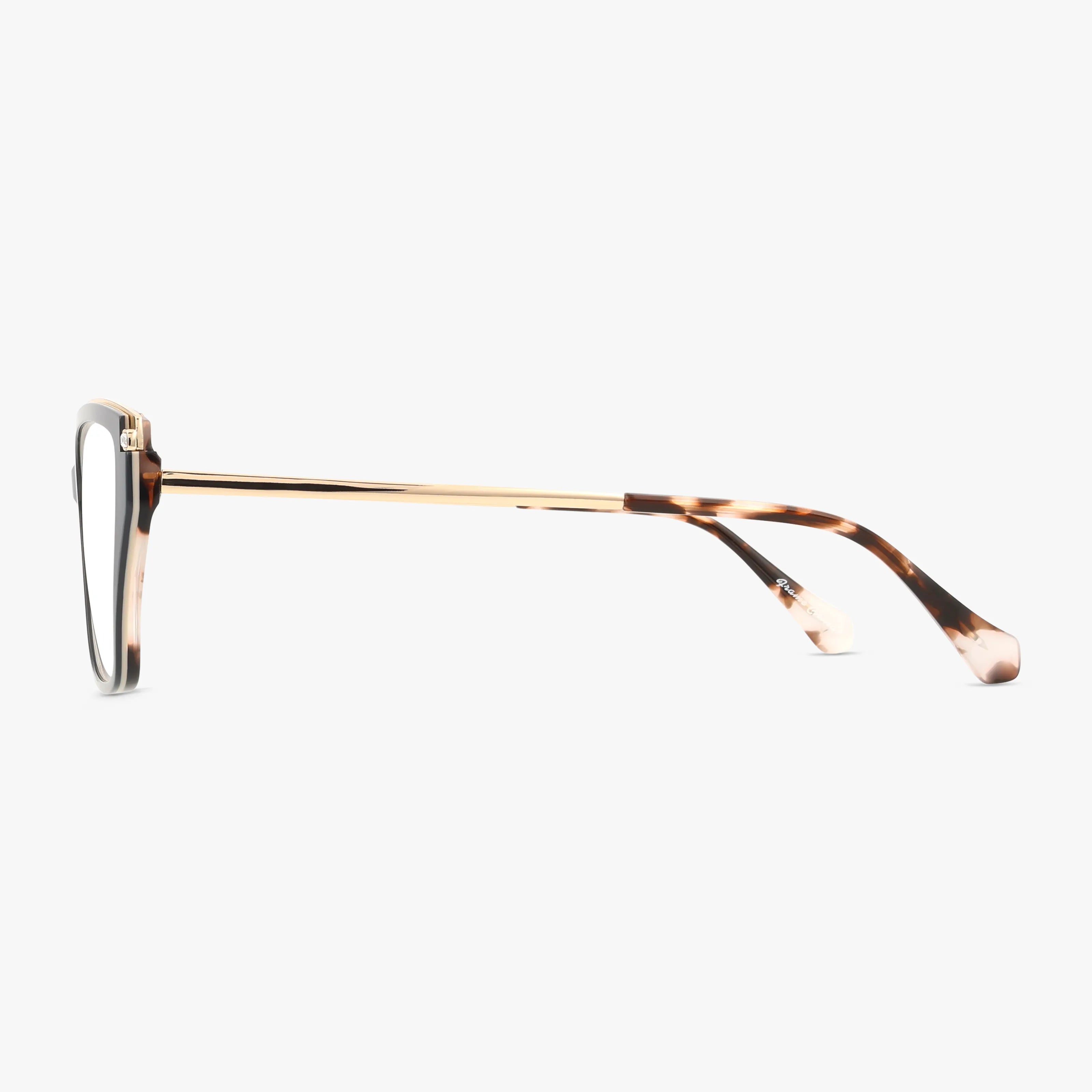 Side view of St. Moritz EMILY frames featuring gold metal arms, tortoiseshell-patterned tips, and clear lenses—a refined eyewear choice that exudes lasting elegance against a plain white background.