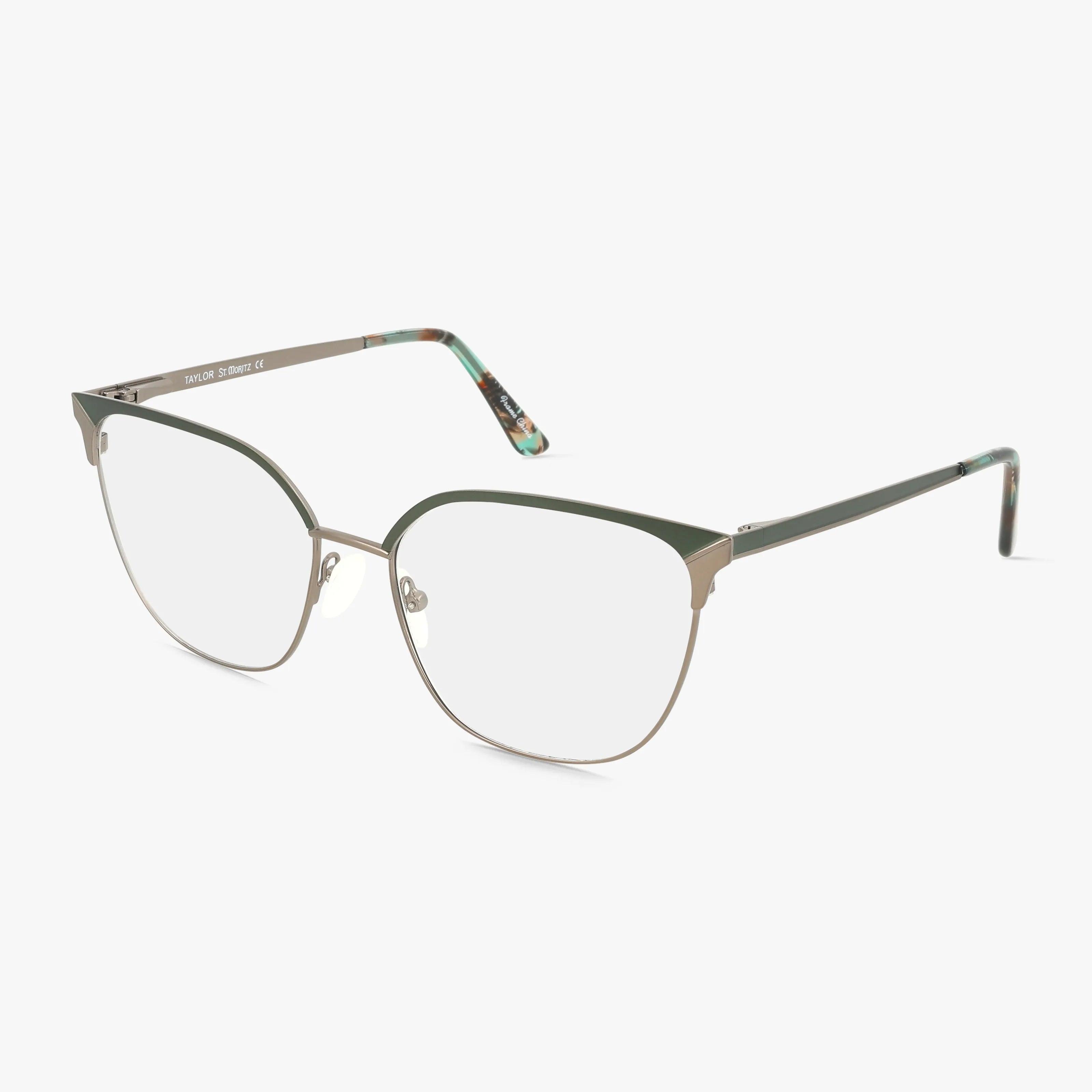 The St. Moritz TYALOR eyewear features a durable silver green metal frame with a matte green upper rim, thin gold lower rim, and patterned green temples. Displayed against a white background.