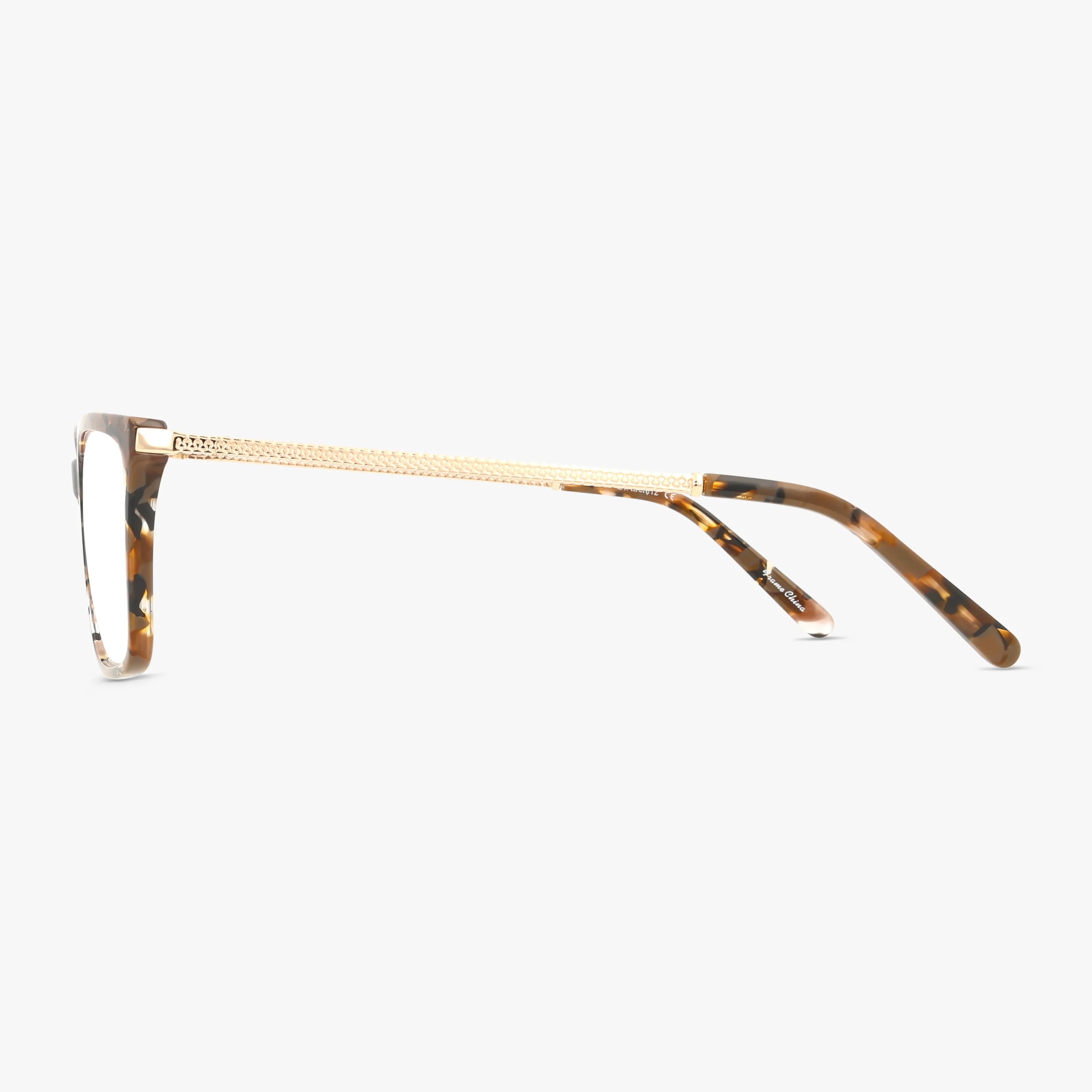 Side view of St. Moritz MIA eyeglasses featuring a resilient tortoiseshell-patterned frame and gold textured metal arms, offering a contemporary design against a white background.