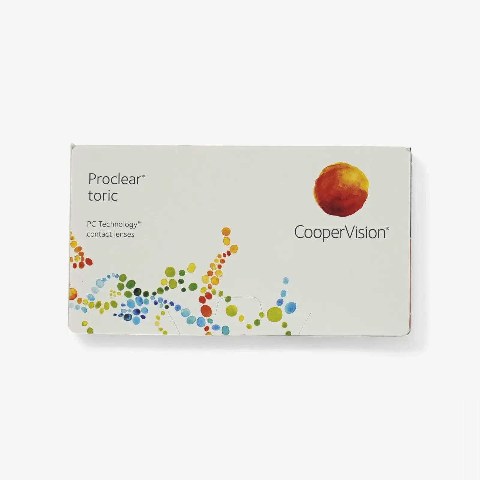 A white box of Proclear Toric - 6 Pk contact lenses for astigmatism, featuring colorful dotted patterns and an orange circle logo in the top right corner, with Proclear branding and lens type text.