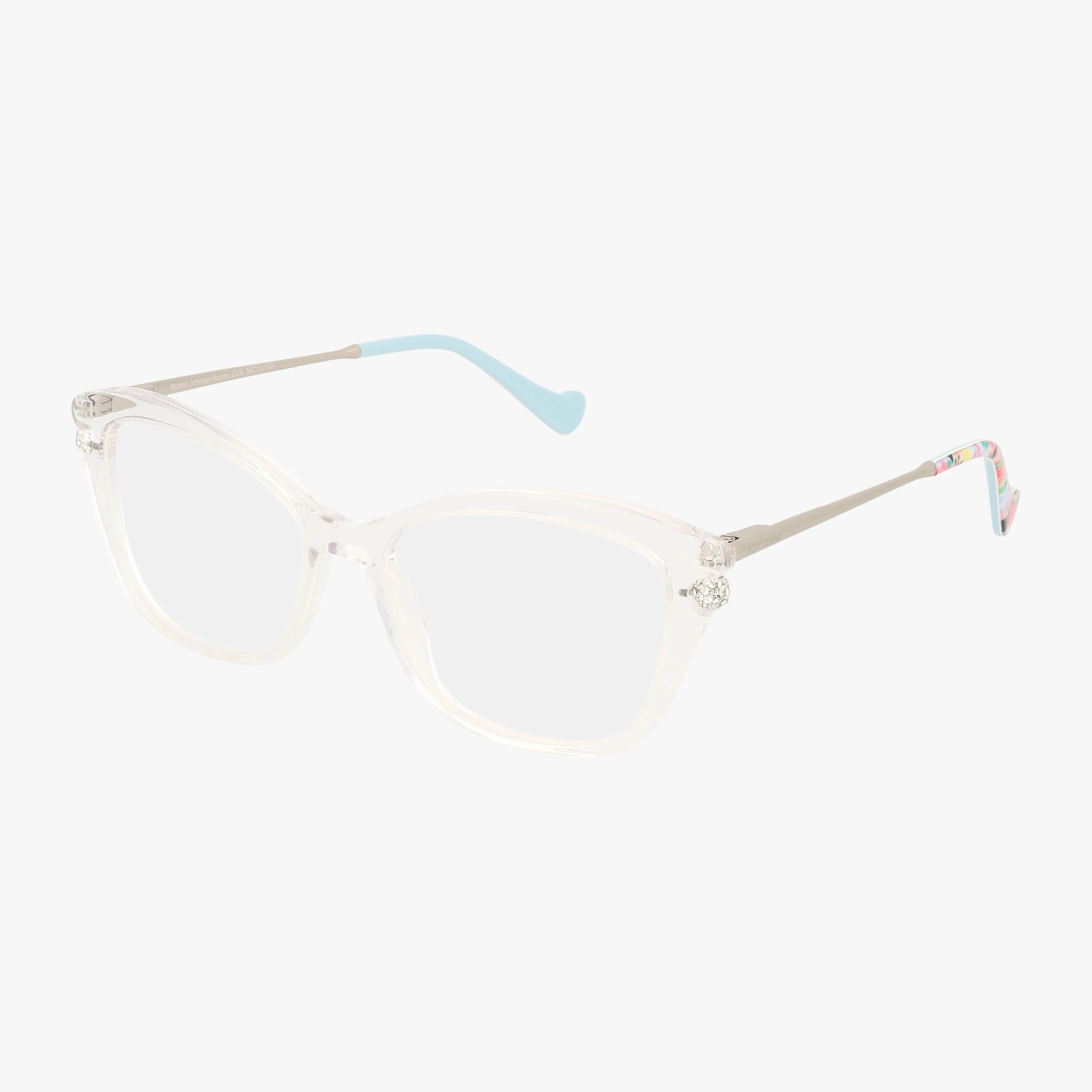 The Betsey Johnson HUNNY eyeglasses feature clear square frames with silver metal arms, blue ear tips, and multicolored accents near the ends—adding playful sparkle—shown on a white background.