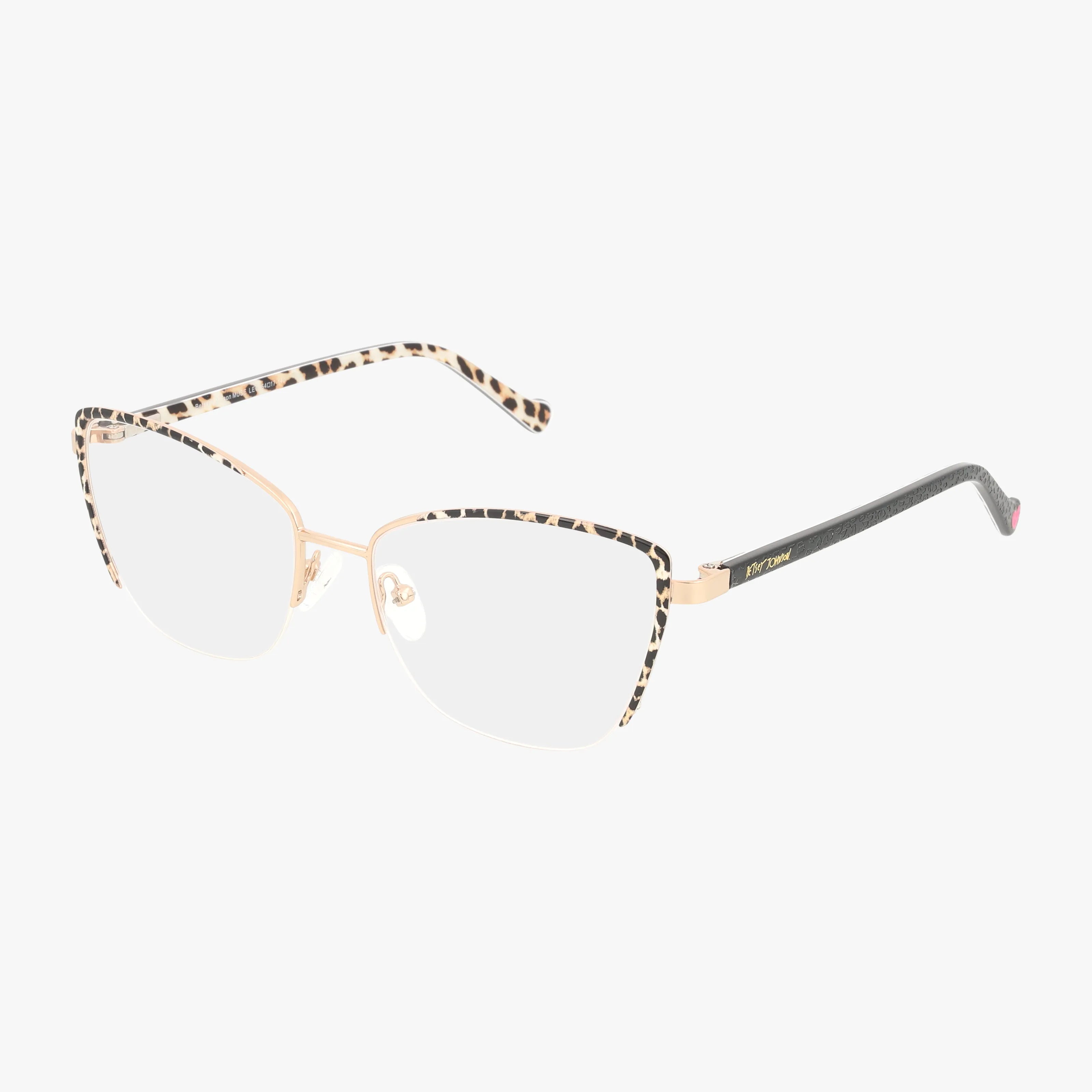 The Betsey Johnson MUSE eyeglasses in Gold Leopard feature gold metal cat-eye frames with bold leopard-print accents on the temples and upper rims, presented stylishly against a white background.