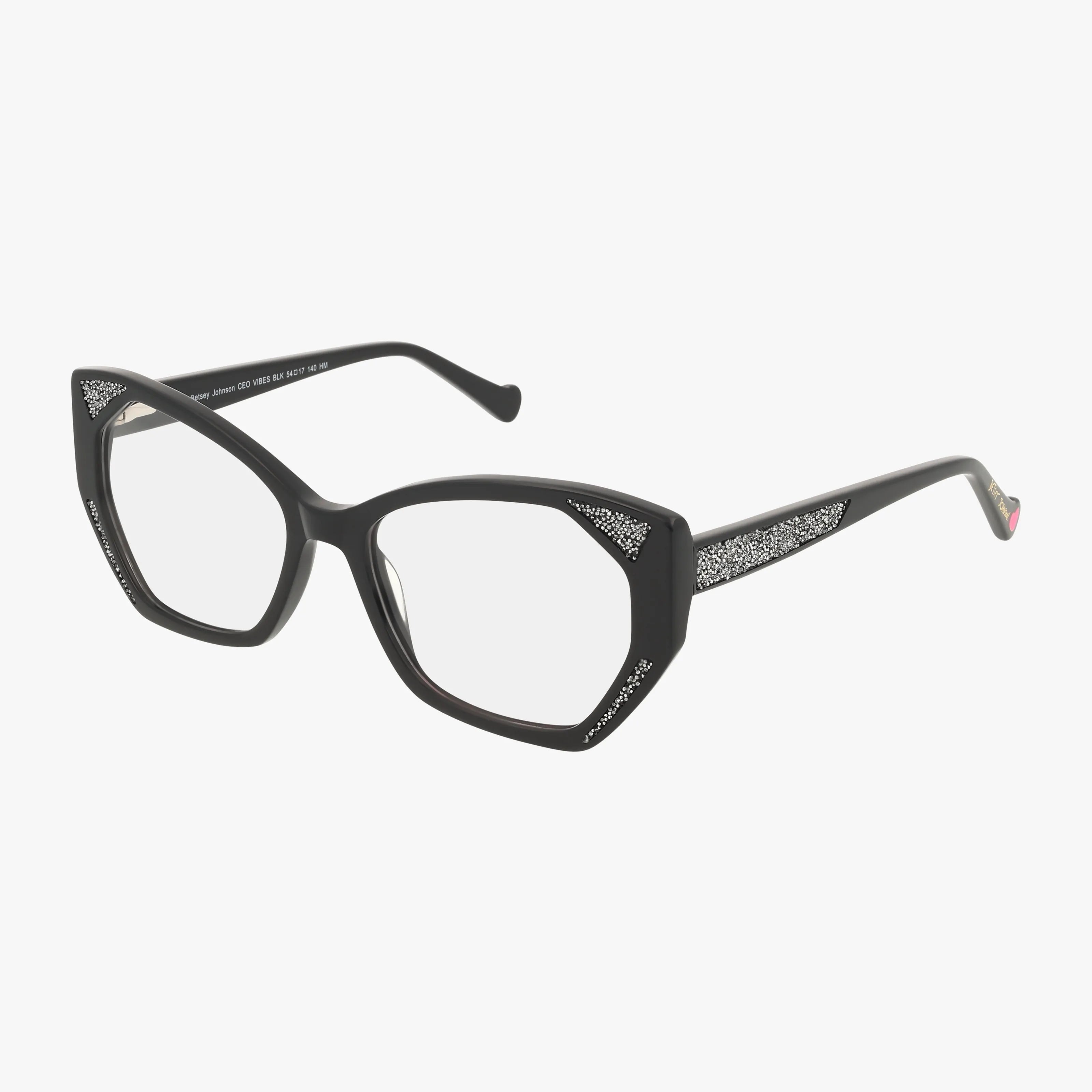 The Betsey Johnson CEO VIBES eyeglasses in black feature clear lenses and textured silver accents, offering a bold cat-eye style that exudes confidence—displayed on a white background.