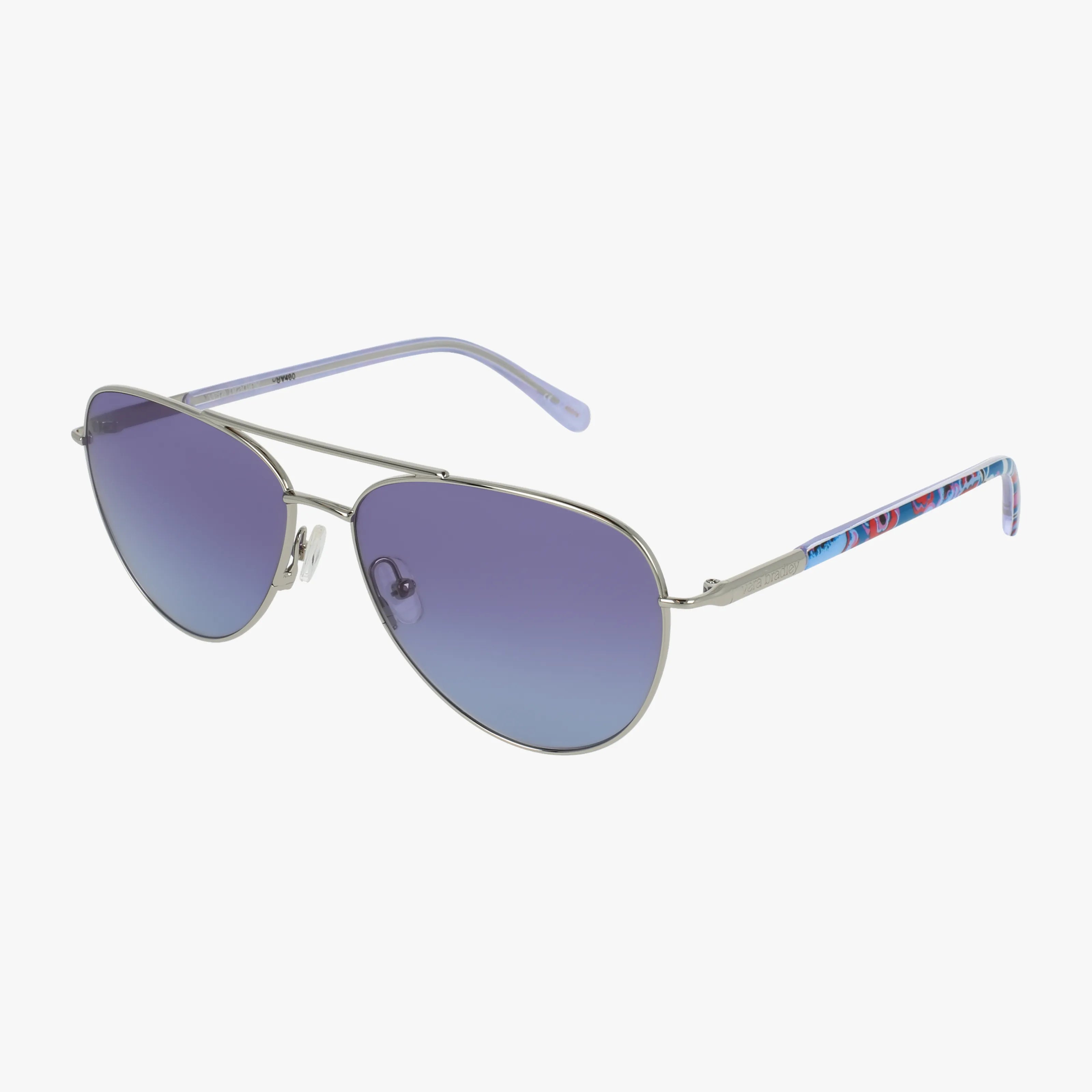 The Vera Bradley PARKER features silver metal aviator frames, blue gradient lenses, and thin lightweight arms with a vibrant red, blue, and white pattern near the hinges.
