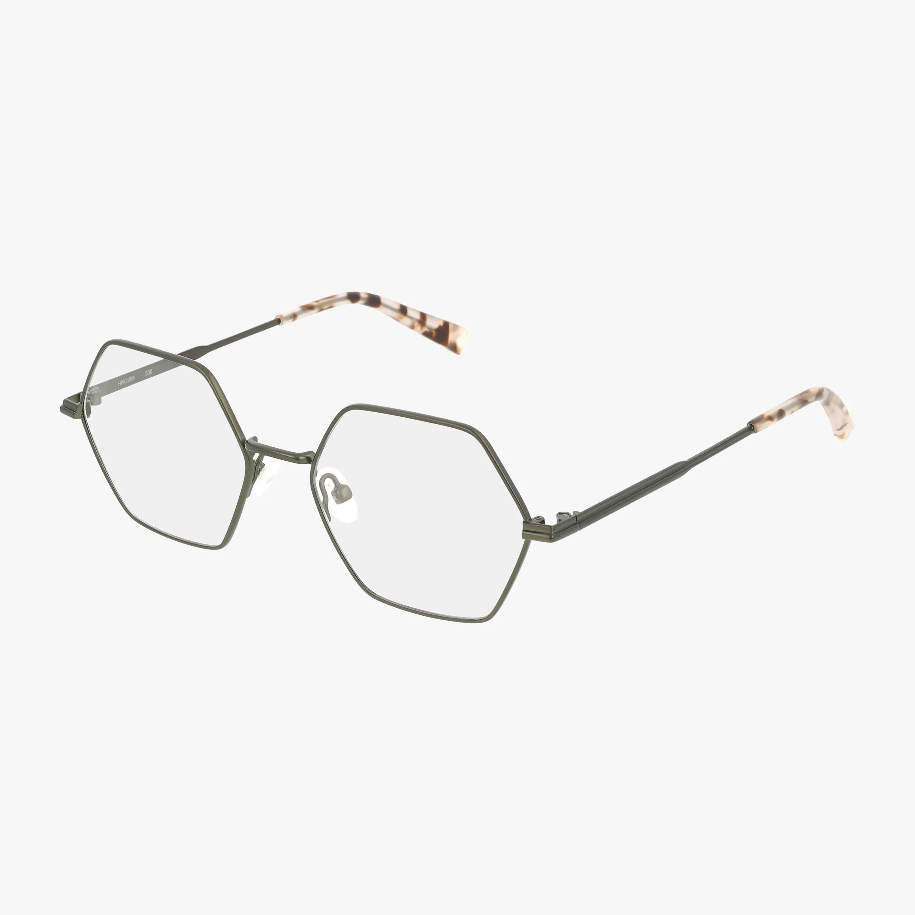 The Harper + Roe HR209 eyeglasses feature thin, green hexagonal metal frames with clear lenses and tortoiseshell-patterned temple tips, combining a stylish look with durable design against a white background.