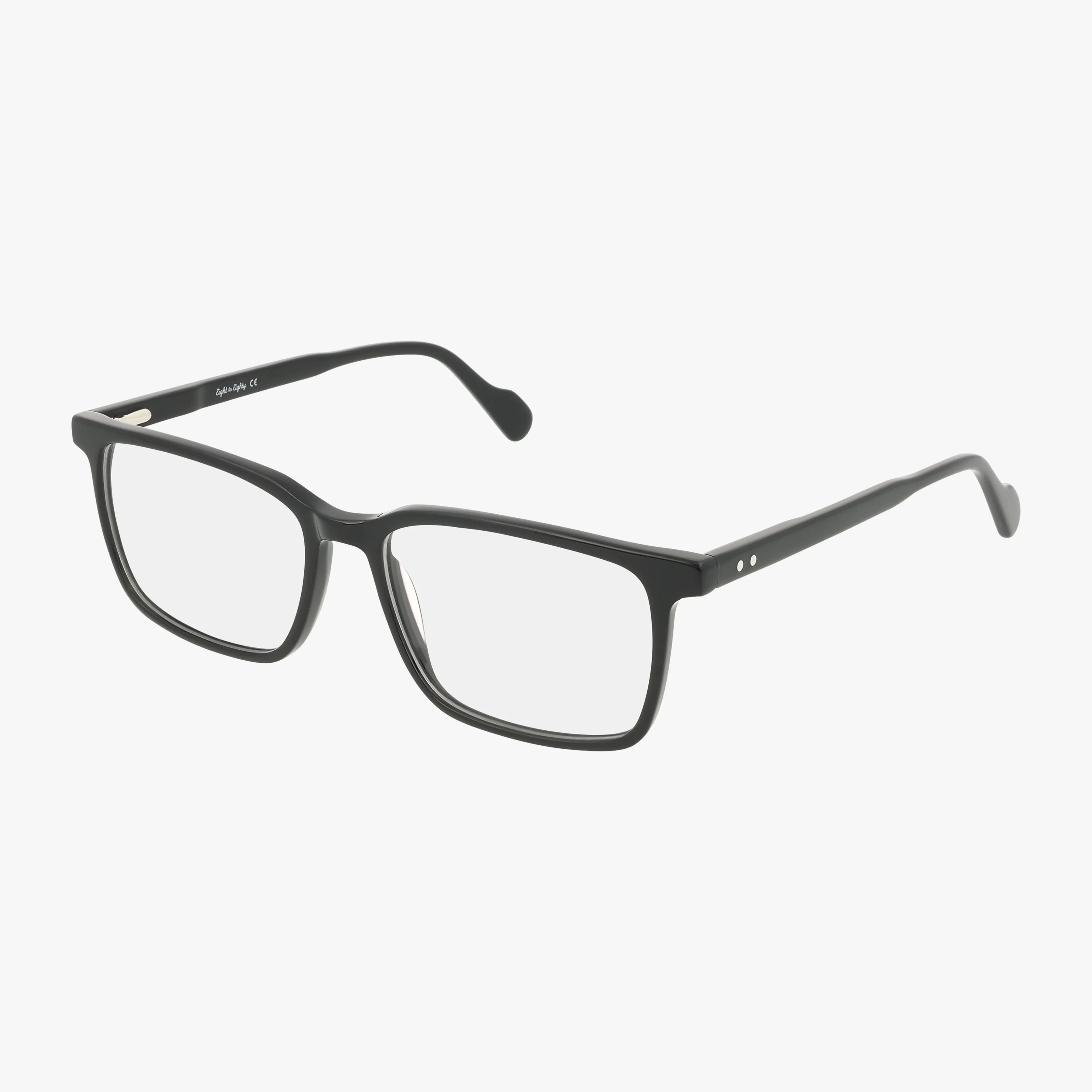 The Eight To Eighty ROGER eyeglasses feature a black rectangular minimalist frame with clear prescription lenses, thin temples, and subtle silver accents by the hinges, shown on a white background.