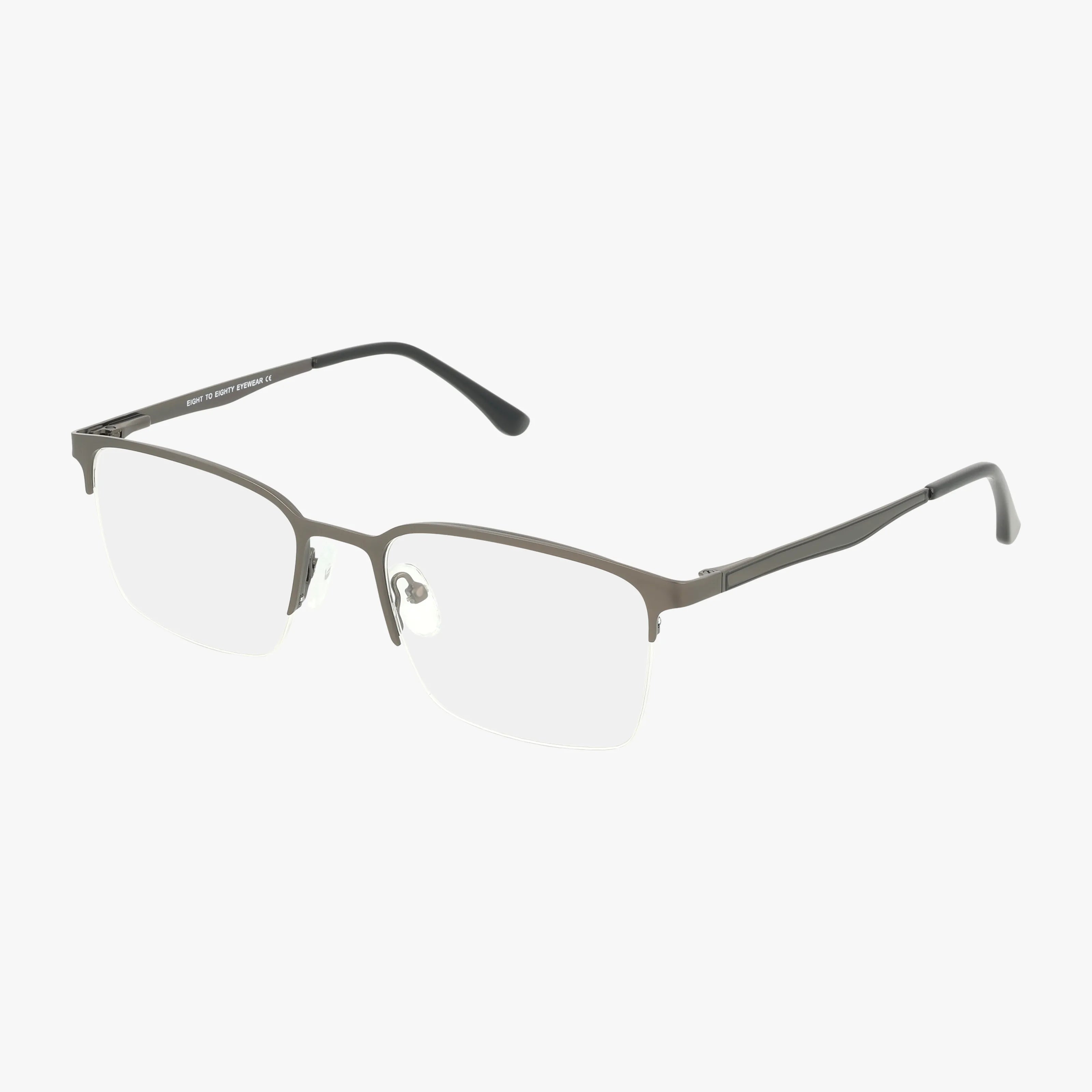 The Eight To Eighty THOMAS is a pair of rectangular, semi-rimless eyeglasses in gunmetal with black temple tips, sturdy build, and thin metallic frames, suitable for progressive lenses, shown on a white background.
