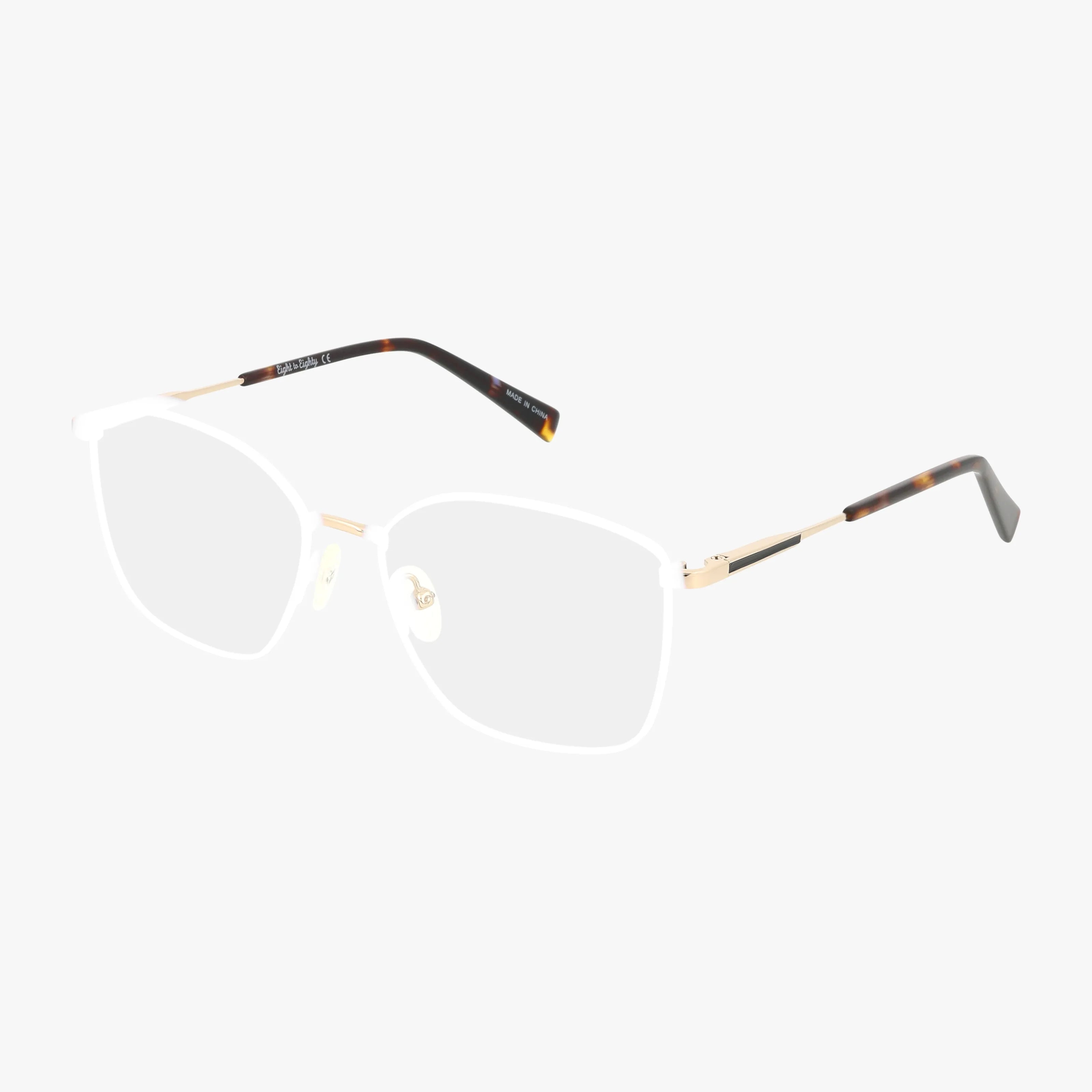 GOLDIE by Eight To Eighty features gold and tortoiseshell rectangular frames with clear nose pads. Gold arms with tortoiseshell tips add a modern twist to this classic style, shown on a white background.