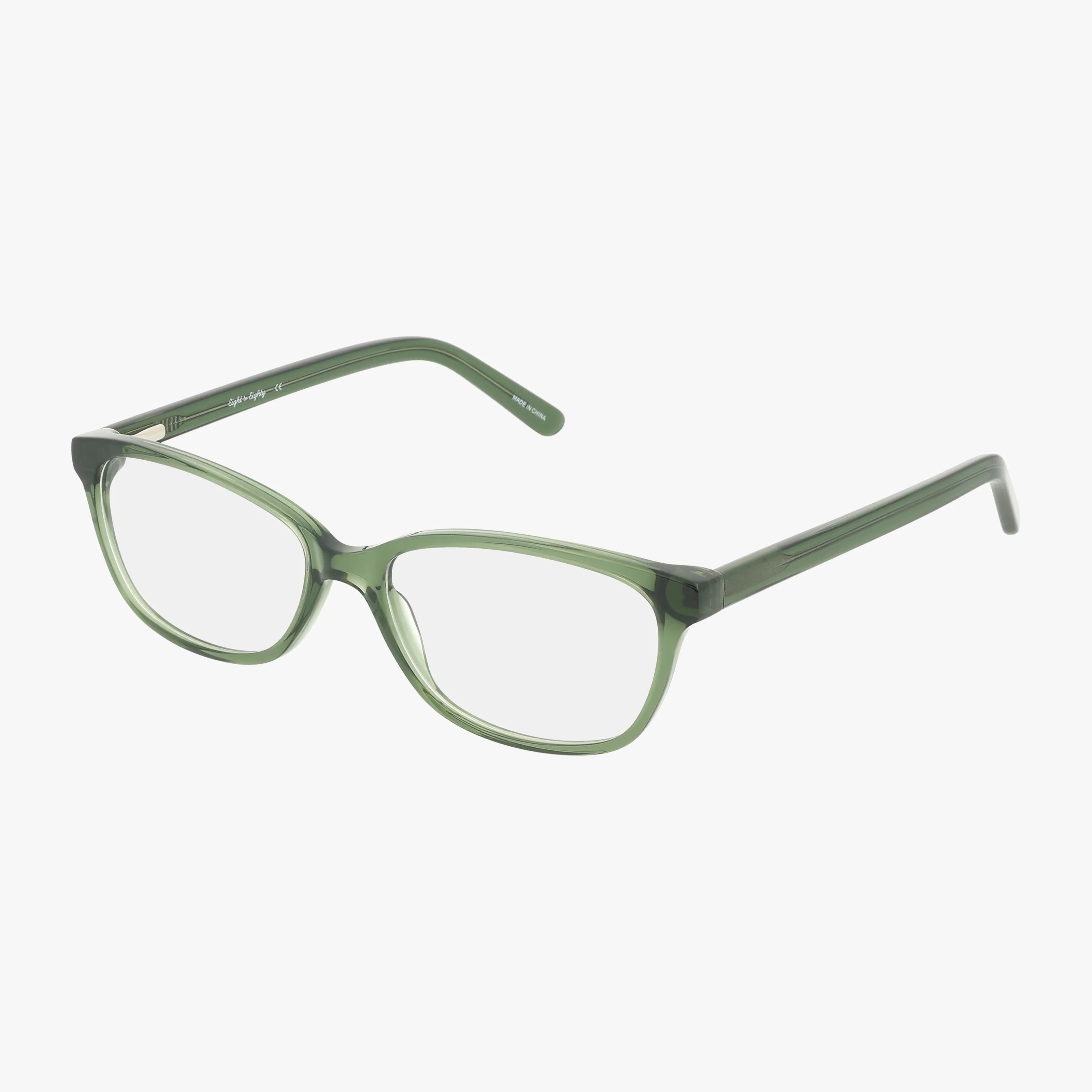 The JOY eyeglass frames by Eight To Eighty feature a green, semi-transparent artistic design with rectangular lenses and gently curved arms, shown against a plain white background.