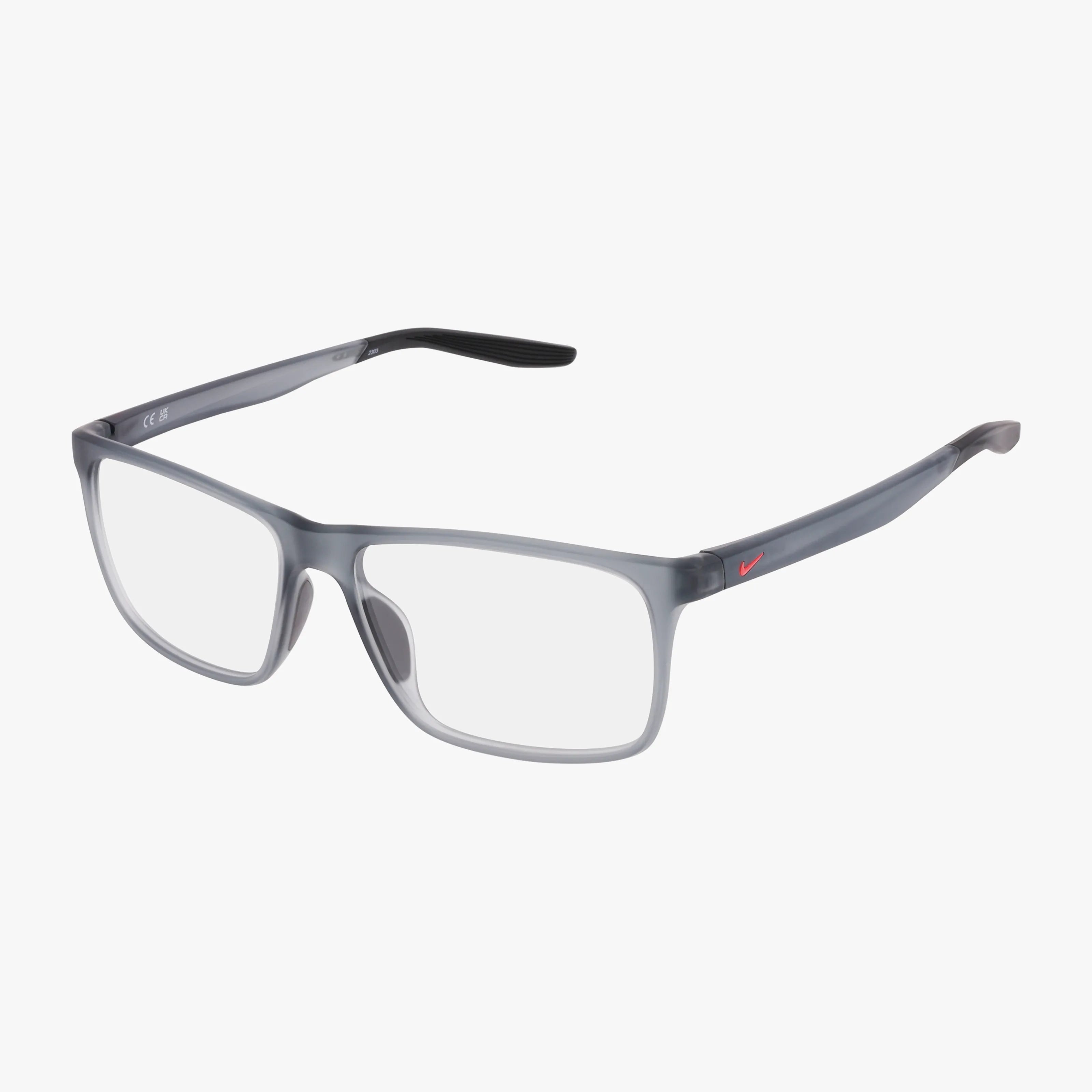 The NIKE 7116 by Nike features rectangular grey matte frames with clear lenses and subtle red accents on the temples. Thin, slightly curved arms add adaptable style, perfect for both streetwear and office looks, shown against a plain white background.