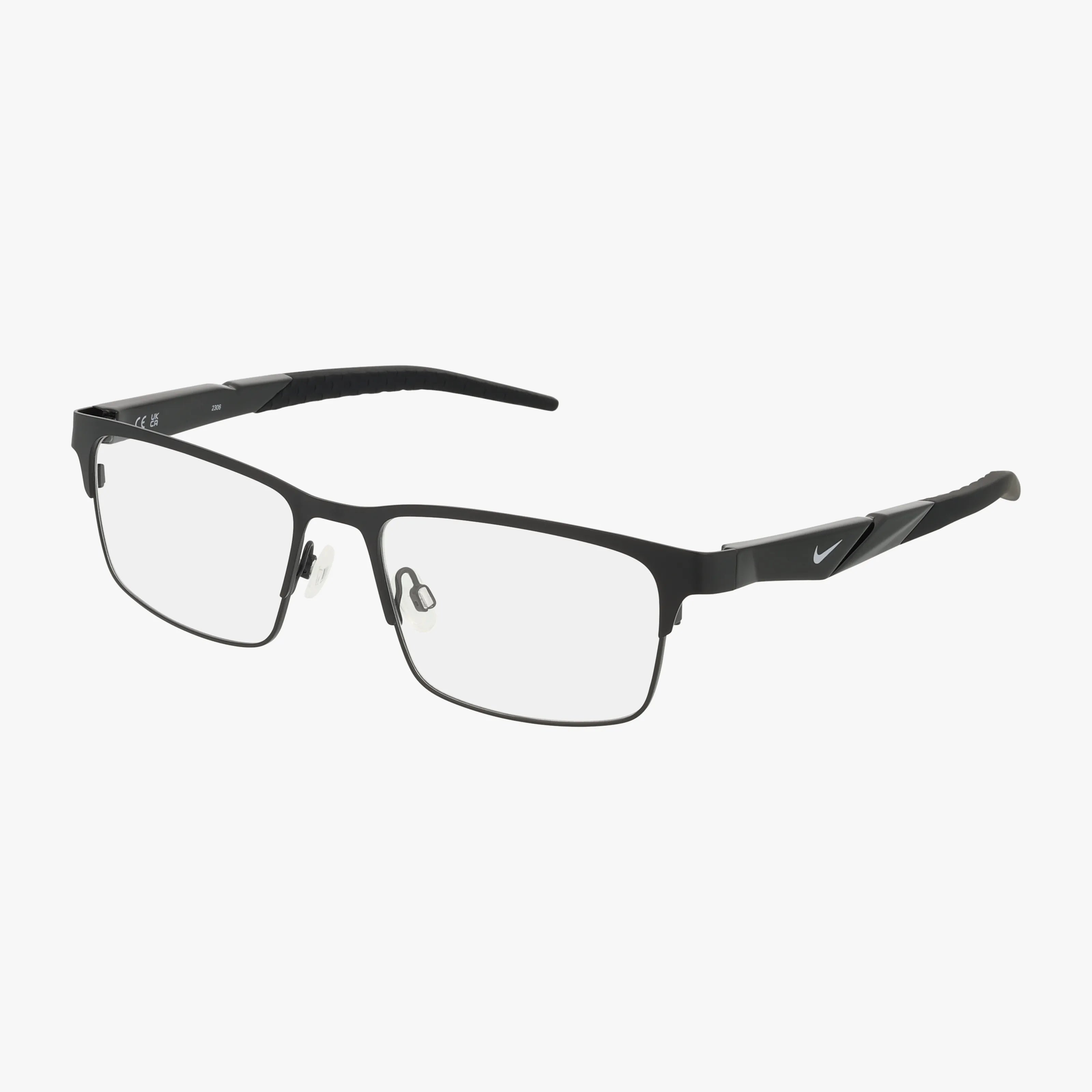 Rectangular black Nike 8154N metal eyewear with clear lenses, adjustable nose pads, Nike logo on the arms, and sporty textured temples.