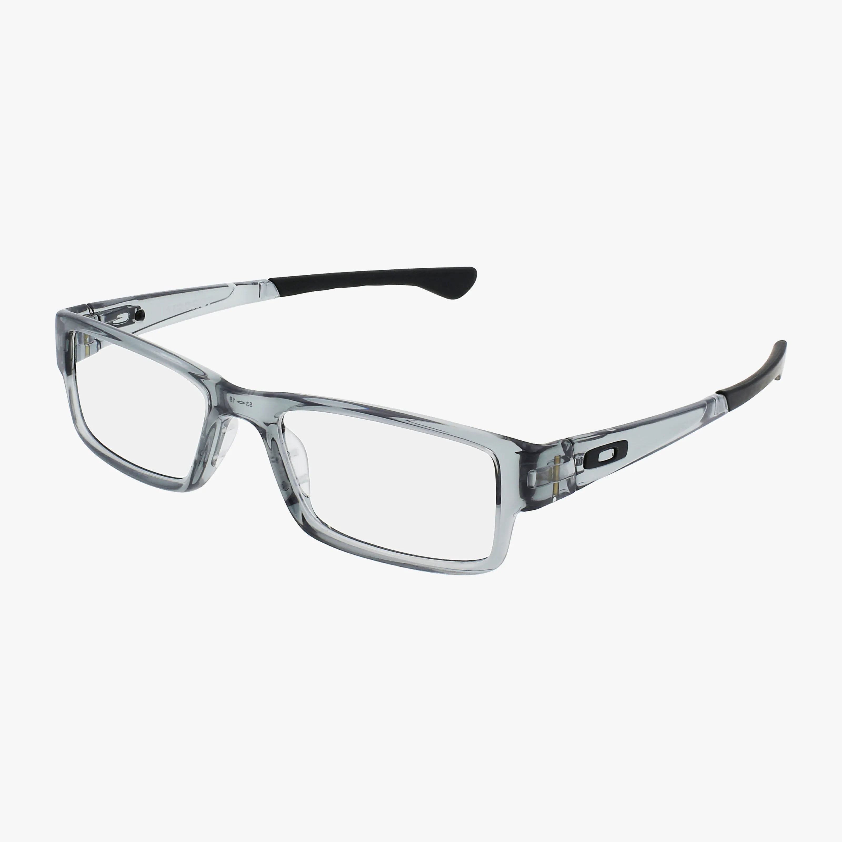The Oakley OX8046 AIRDROP eyeglasses feature a clear, rectangular translucent grey frame with black temple tips and a subtle Oakley logo on the arms, shown against a white background.