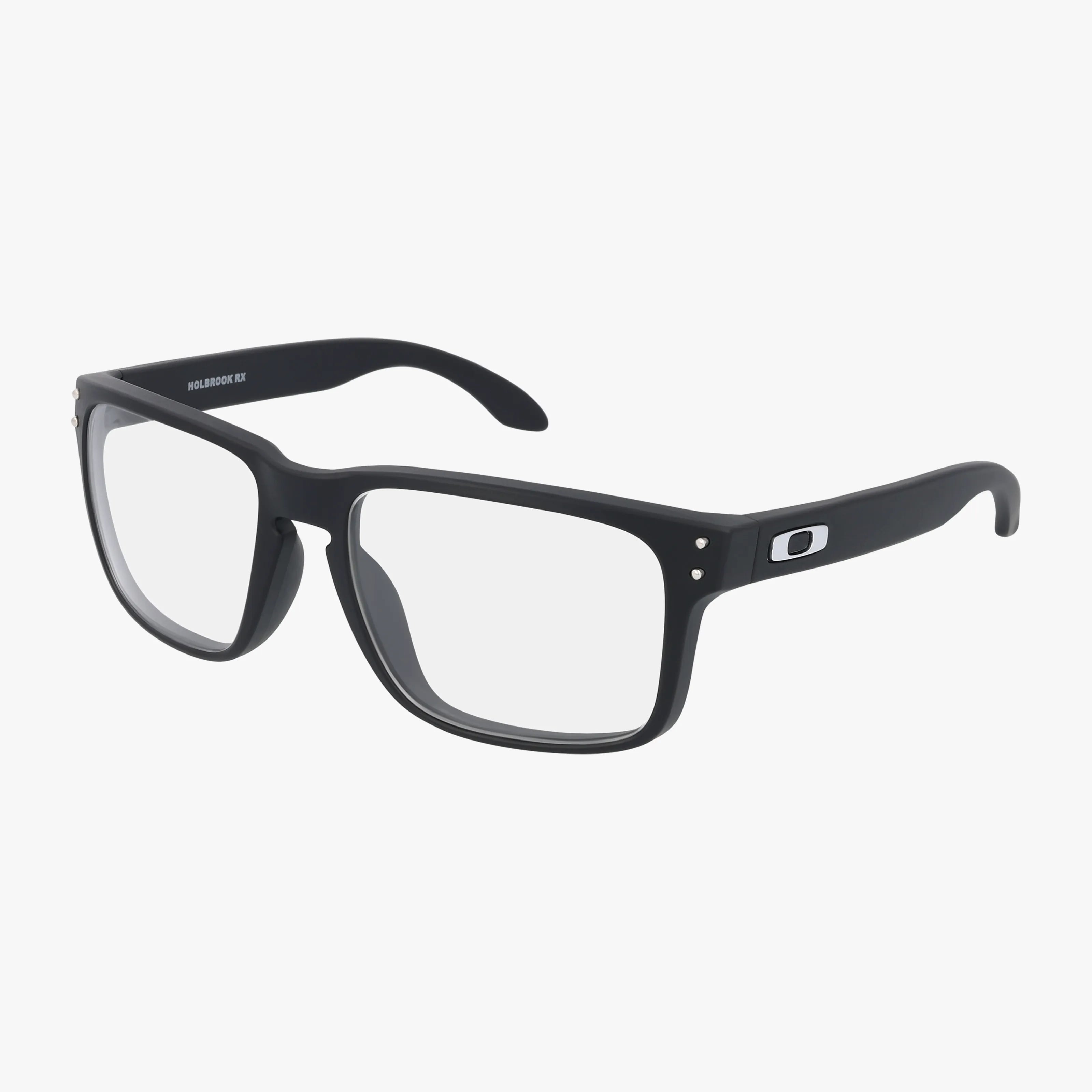 A pair of Oakley OX8156 HOLBROOK RX black rectangular eyewear with clear lenses and the Oakley logo on the left temple is displayed on a white background.