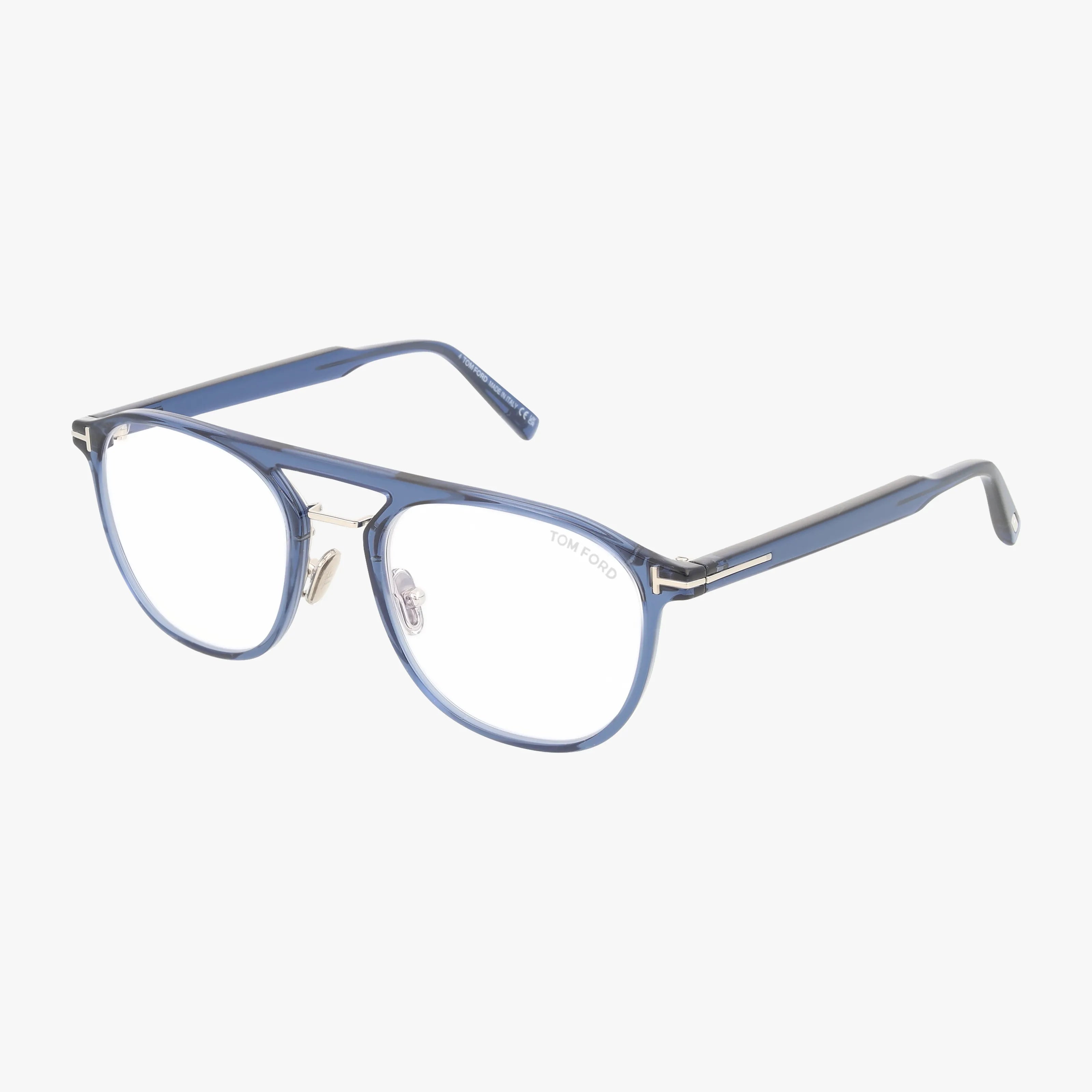 The Tom Ford FT5982-B is a stylish pair of blue eyeglasses with clear lenses and silver temple accents, blending modern elegance for any look. Displayed on a white background.