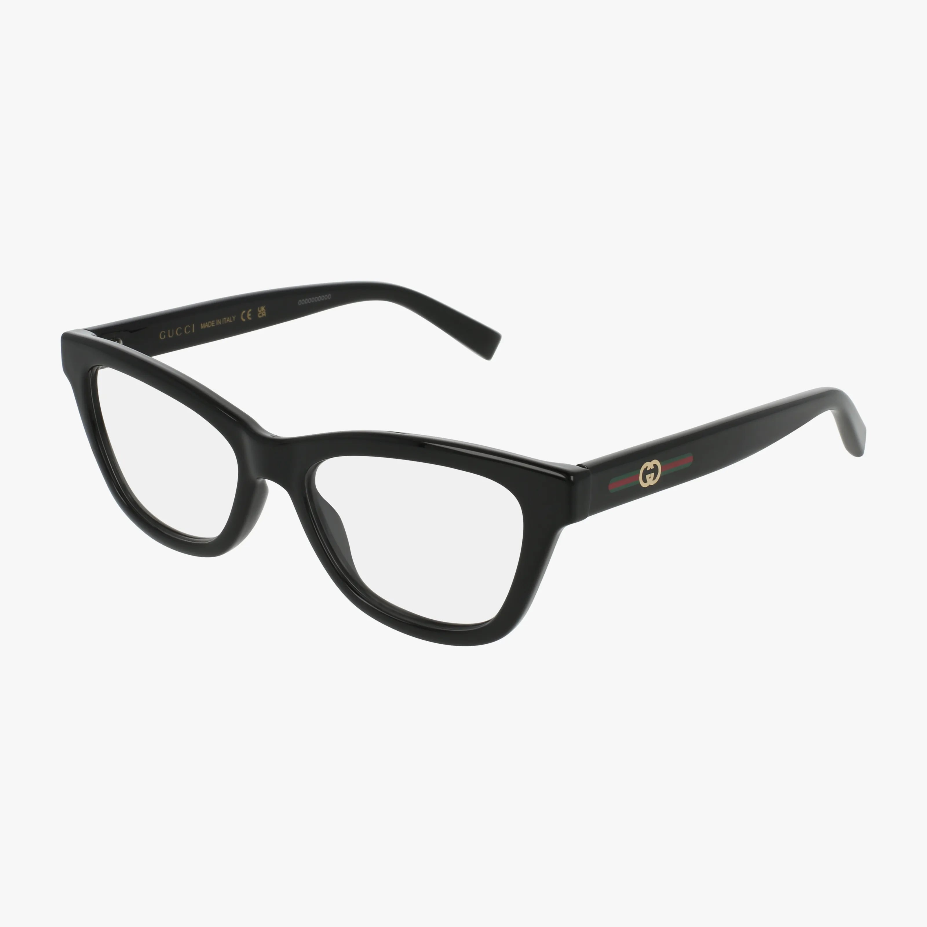 The Gucci 1983O black eyeglasses feature a classic rectangular frame, gold Gucci logo on the arms, and a subtle red/green stripe near the hinges. Clear lenses accentuate their timeless style against a white background.